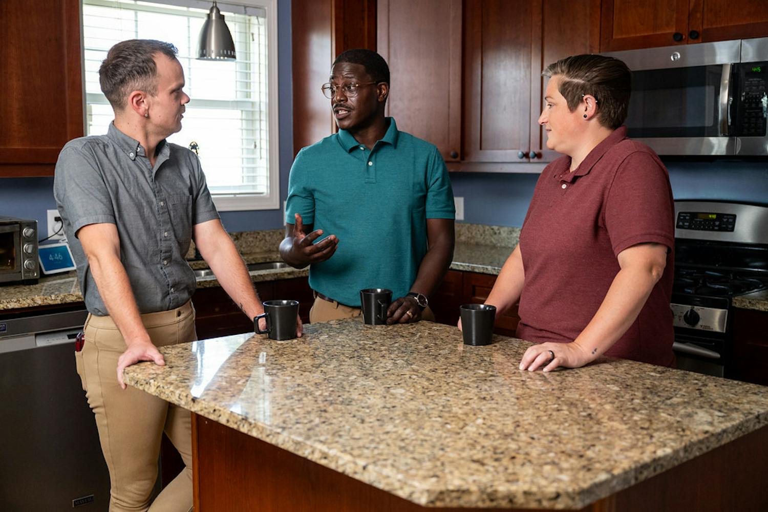A photo of David having a kitchen conversation