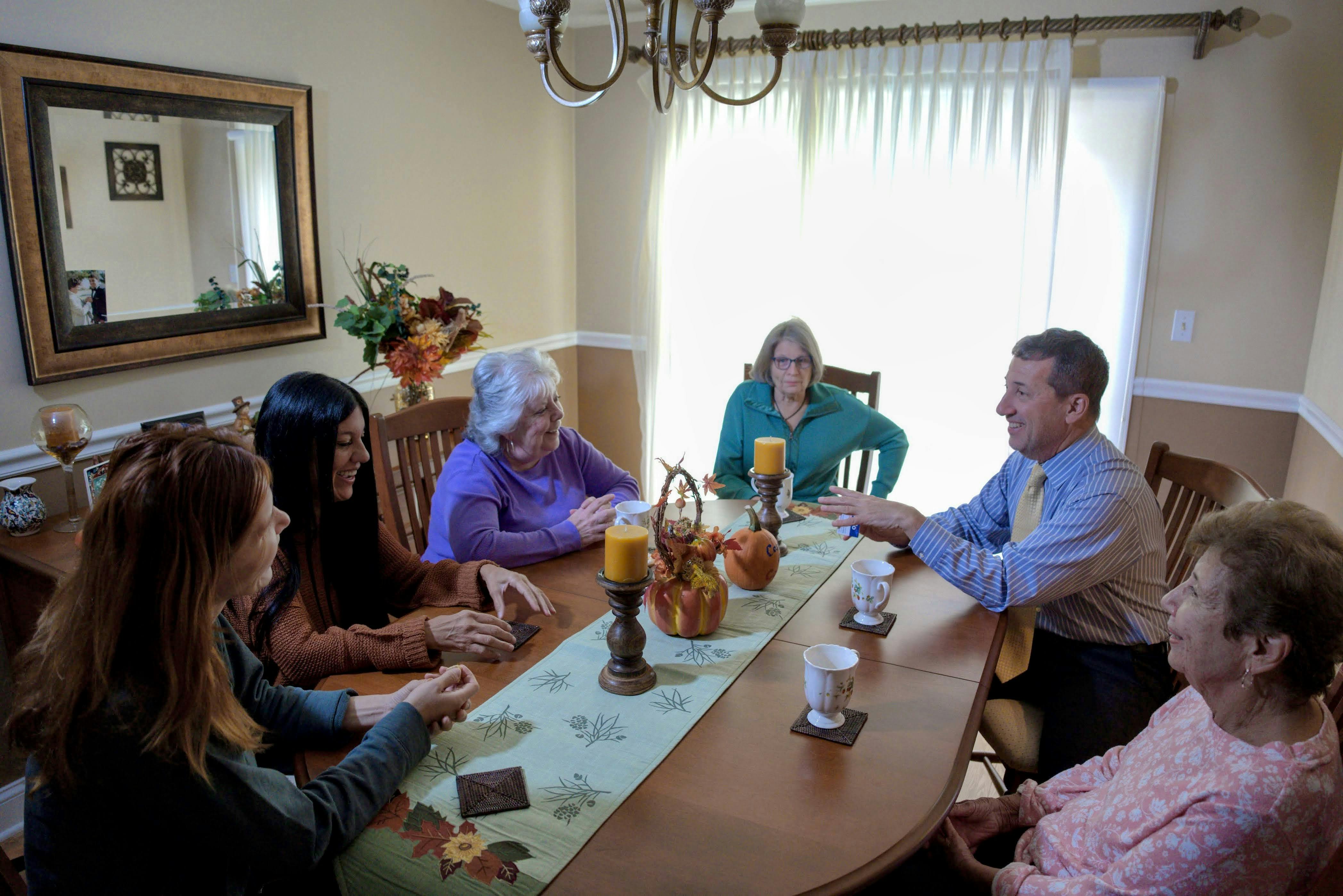 John talking with voters