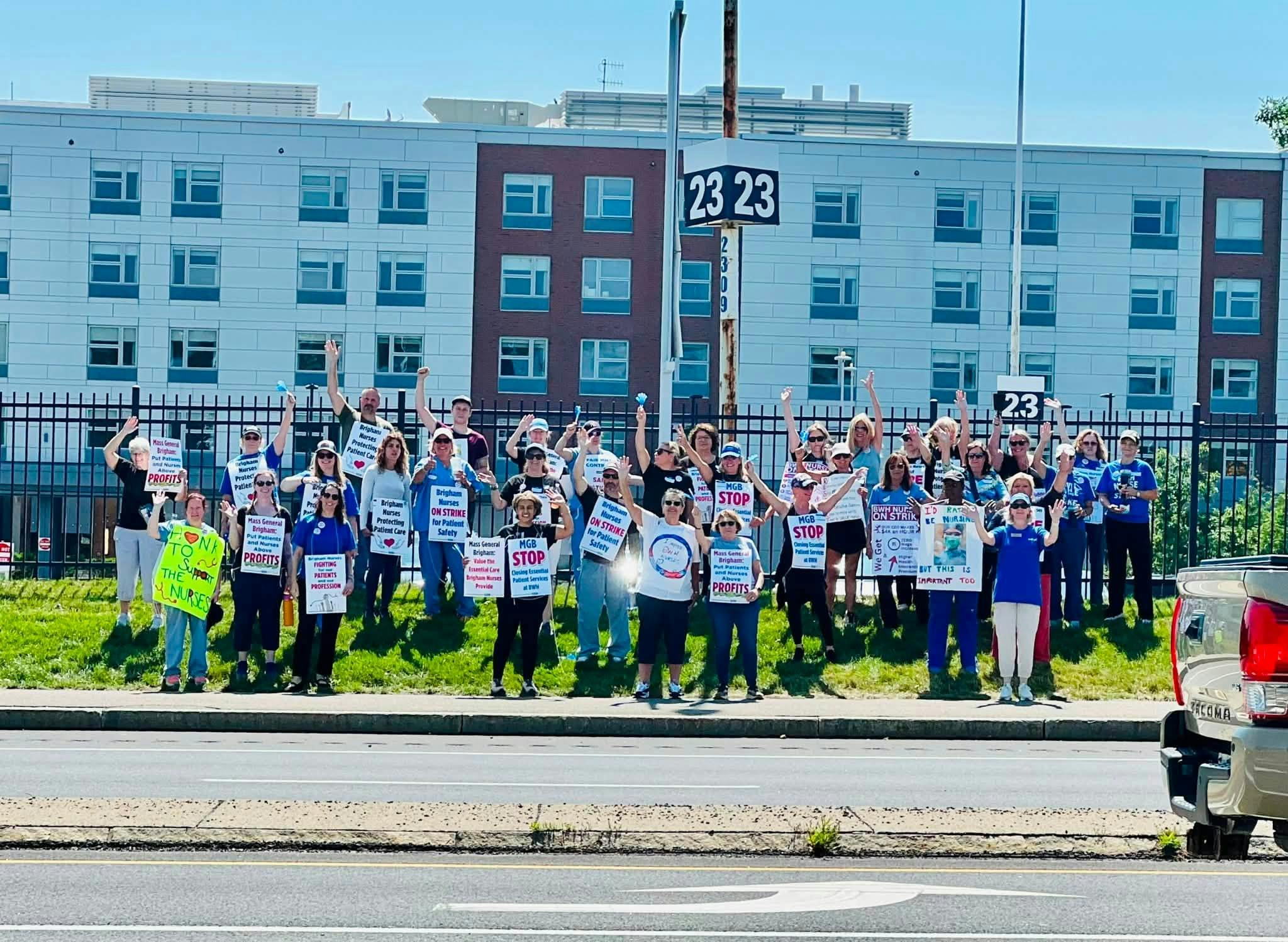 People standing in a group protesting