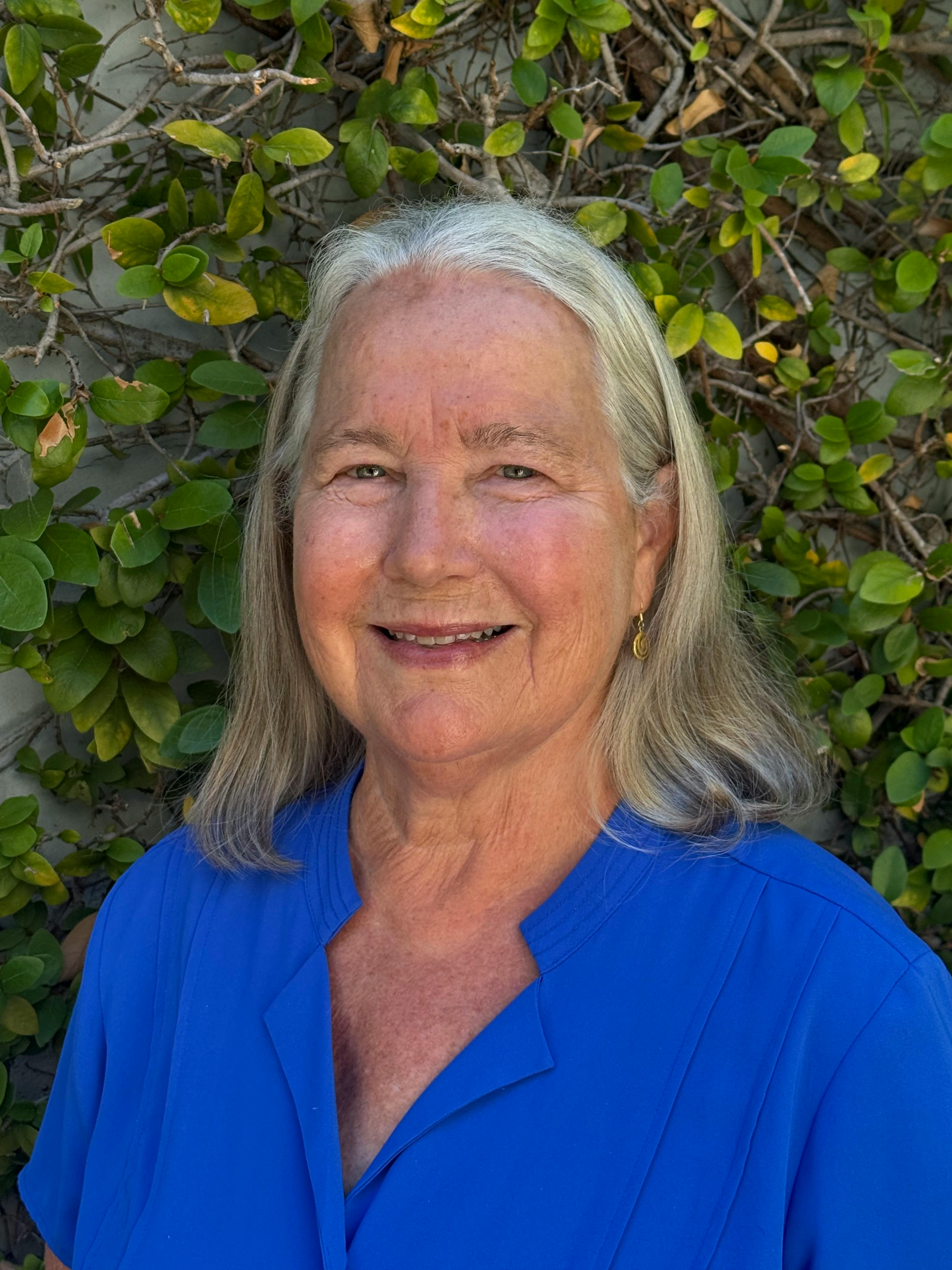 Portrait of Sally Bemus smiling.