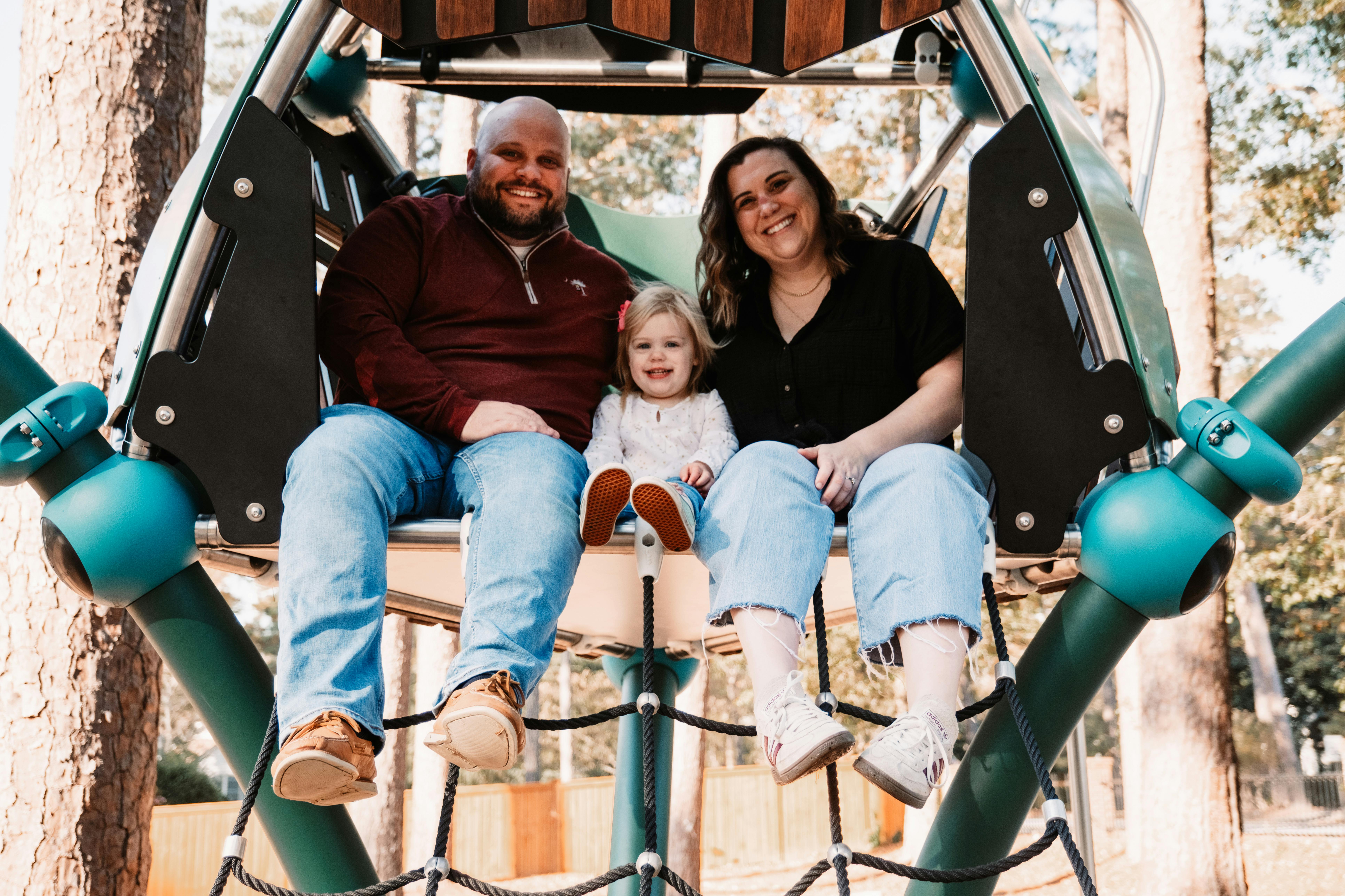 Family sitting in a tree house