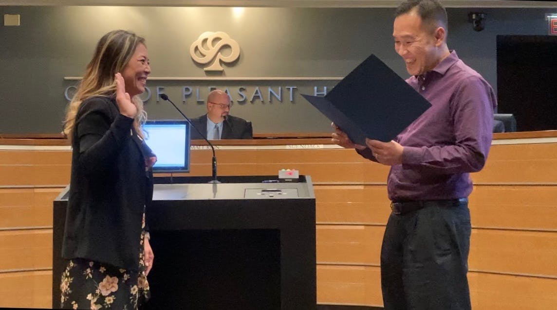 Candidate Dr. Quy Tran swearing in the first AANHPI city councilmember in Pleasant Hill