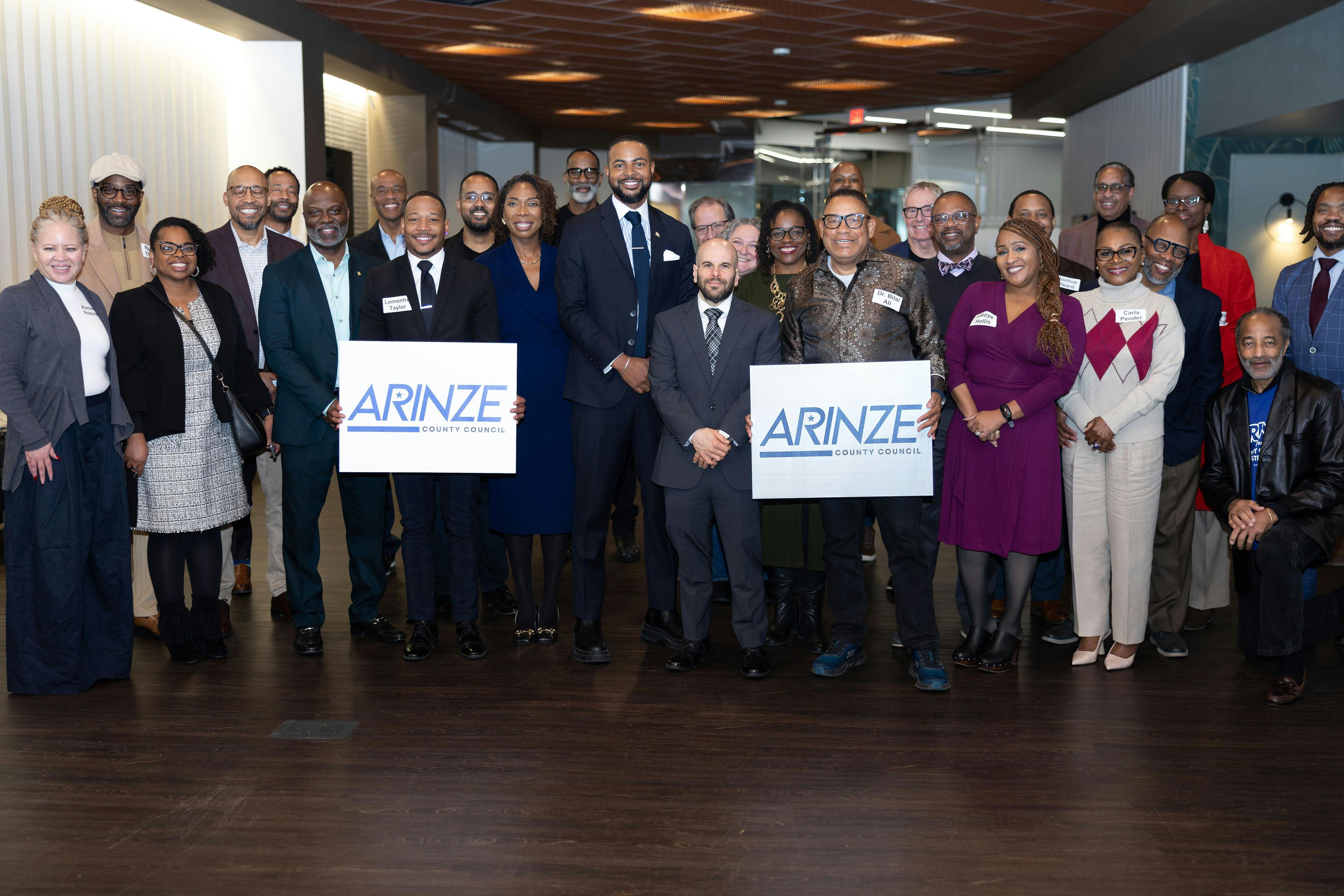 Group campaign photo with Arinze standing in center