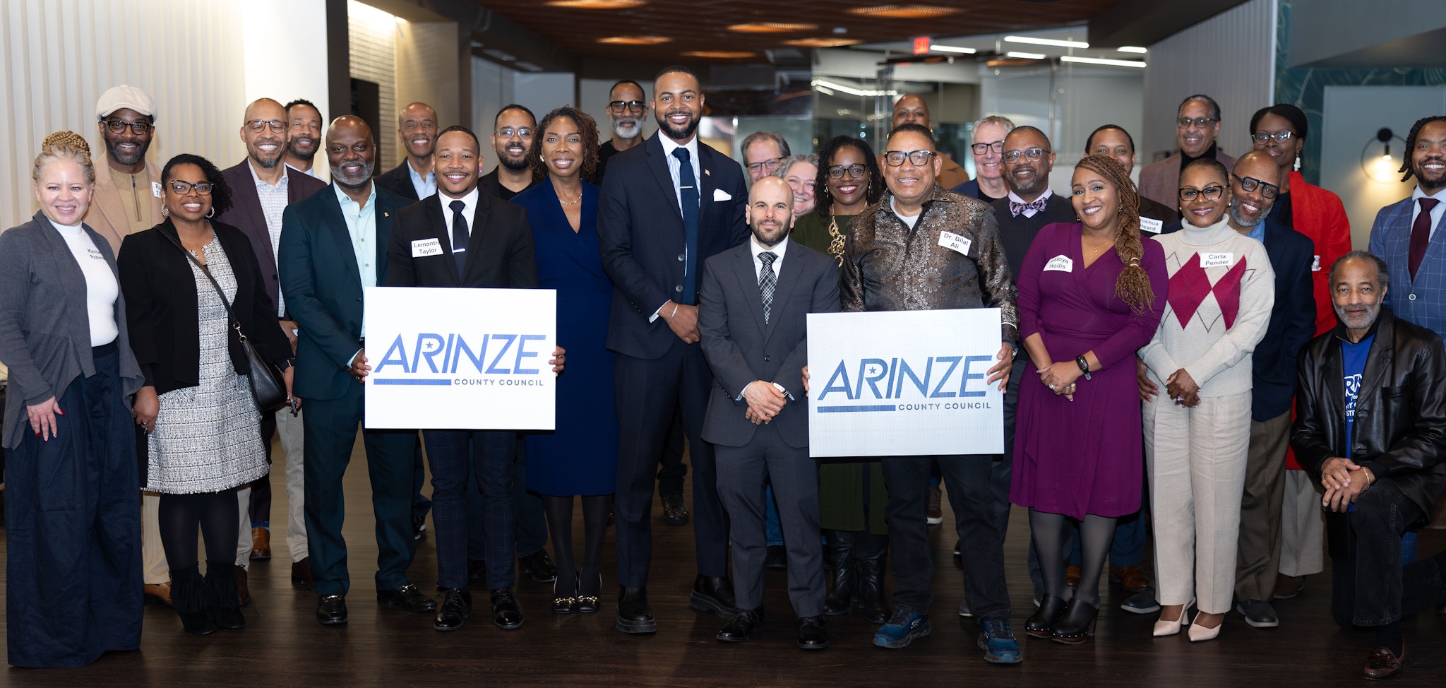 Group campaign photo with Arinze standing in center