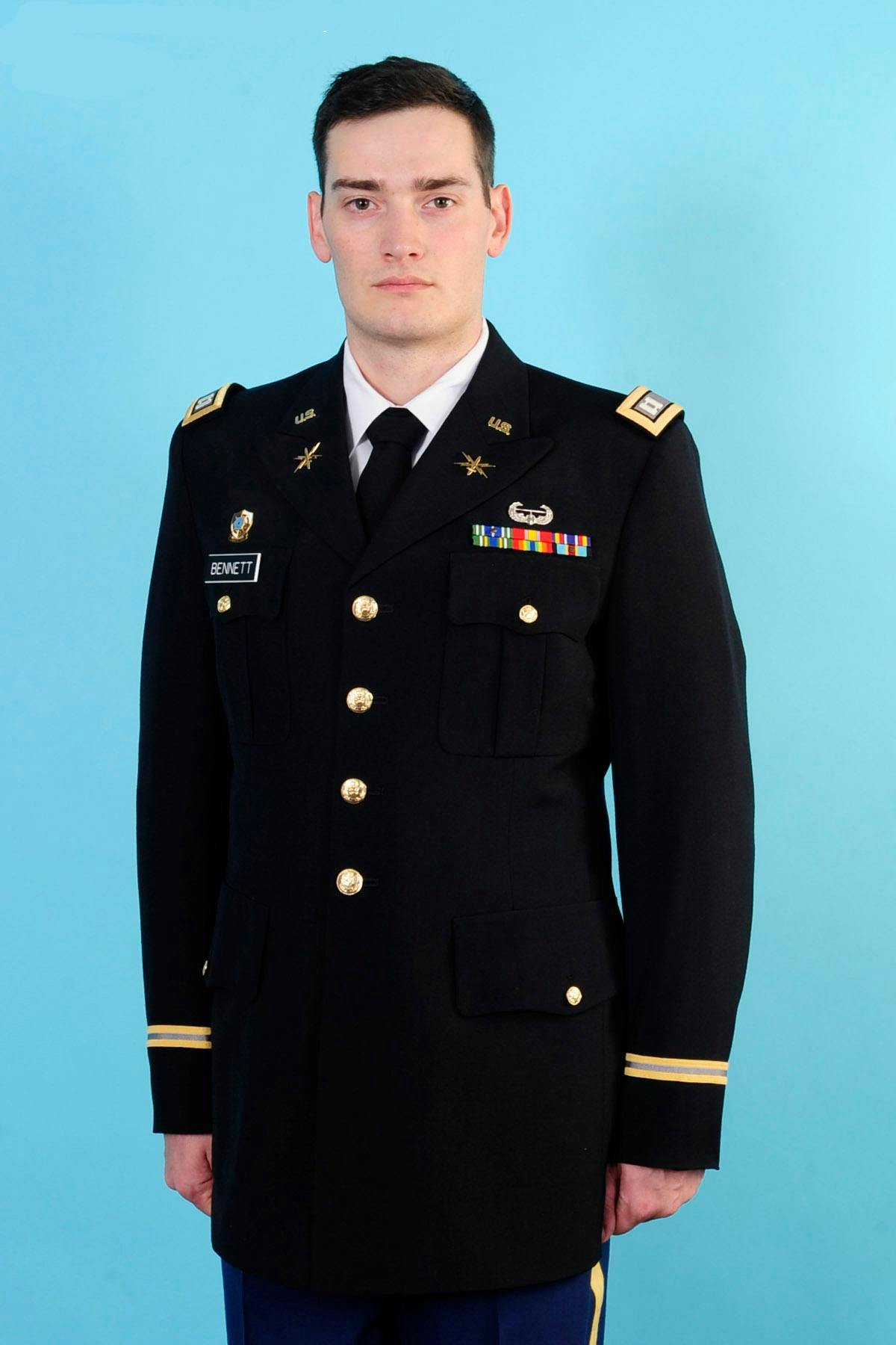 Captain Chris Bennett in army dress blue uniform for Department of the Army photograph