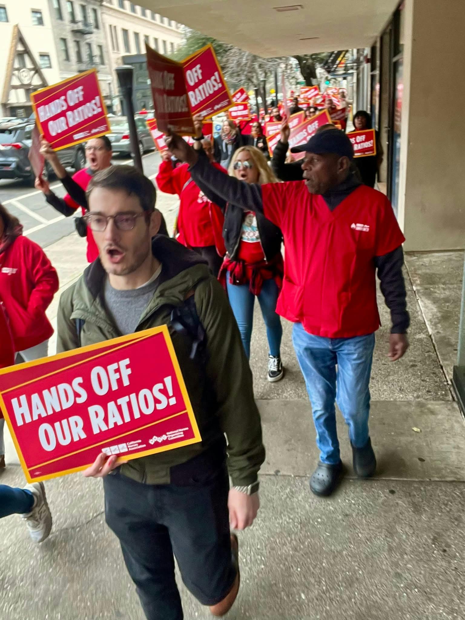 1-21-26 Chris marching with nurses
