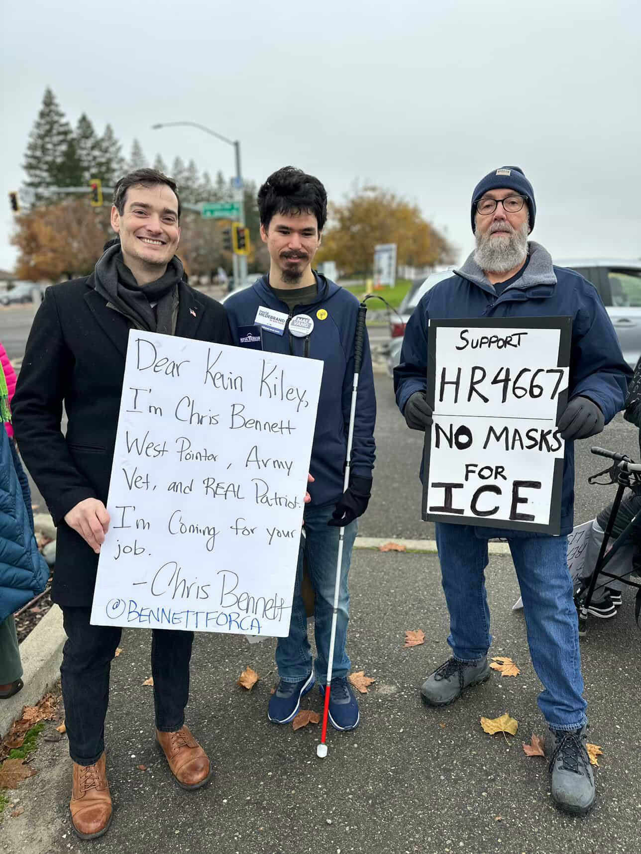 Chris Bennett with two others protesting ICE/CPB recruiting at Jessup U in Rocklin on Dec 8, 2025
