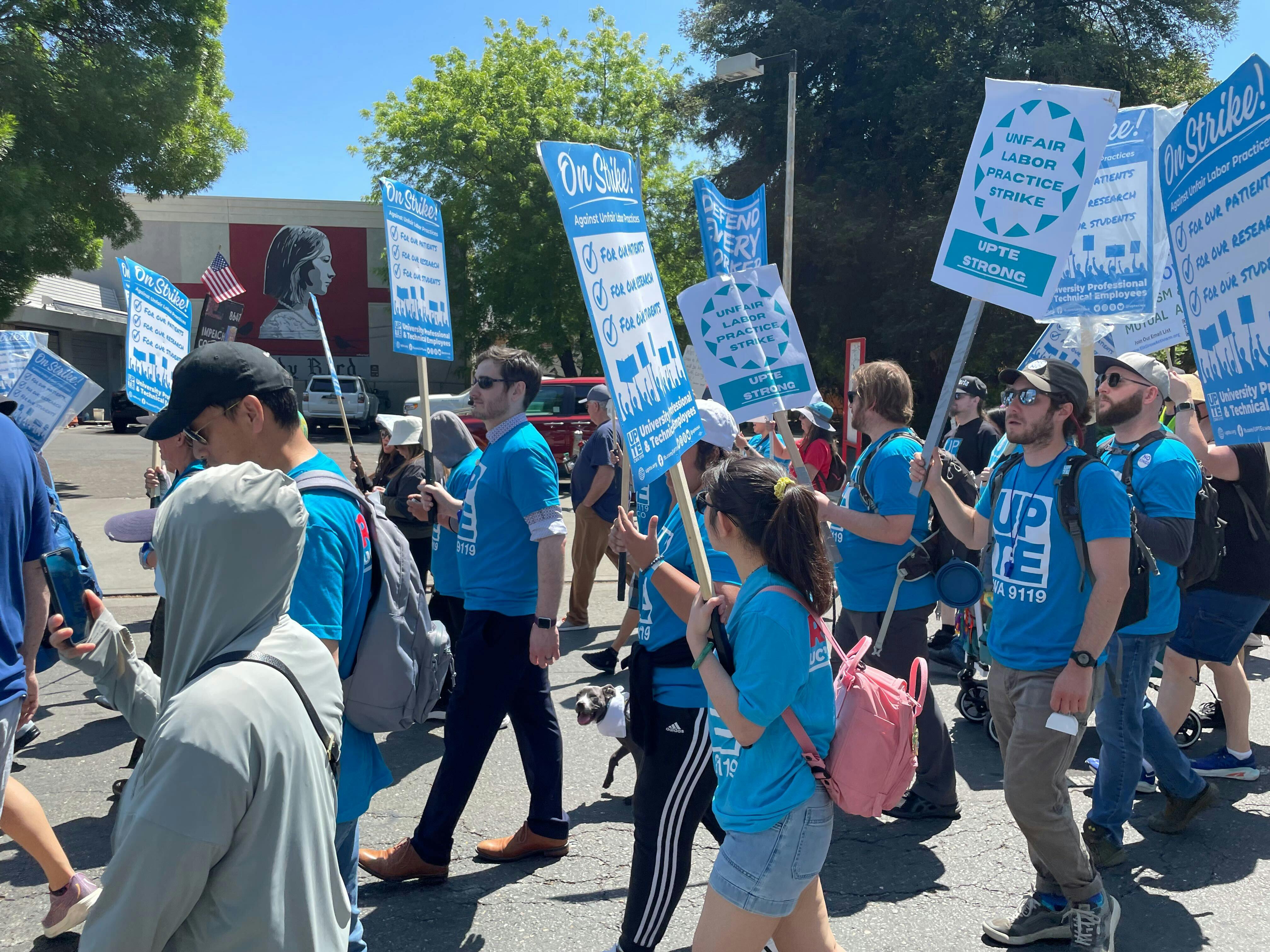 5-1-25 Chris on the picket line with UPTE-CWA 9119 in May 2025