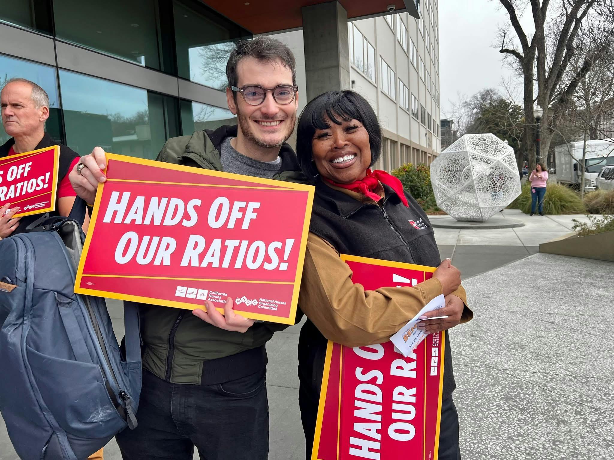 1-21-26 Chris with a nurse at the Hands Off Our Ratios rally