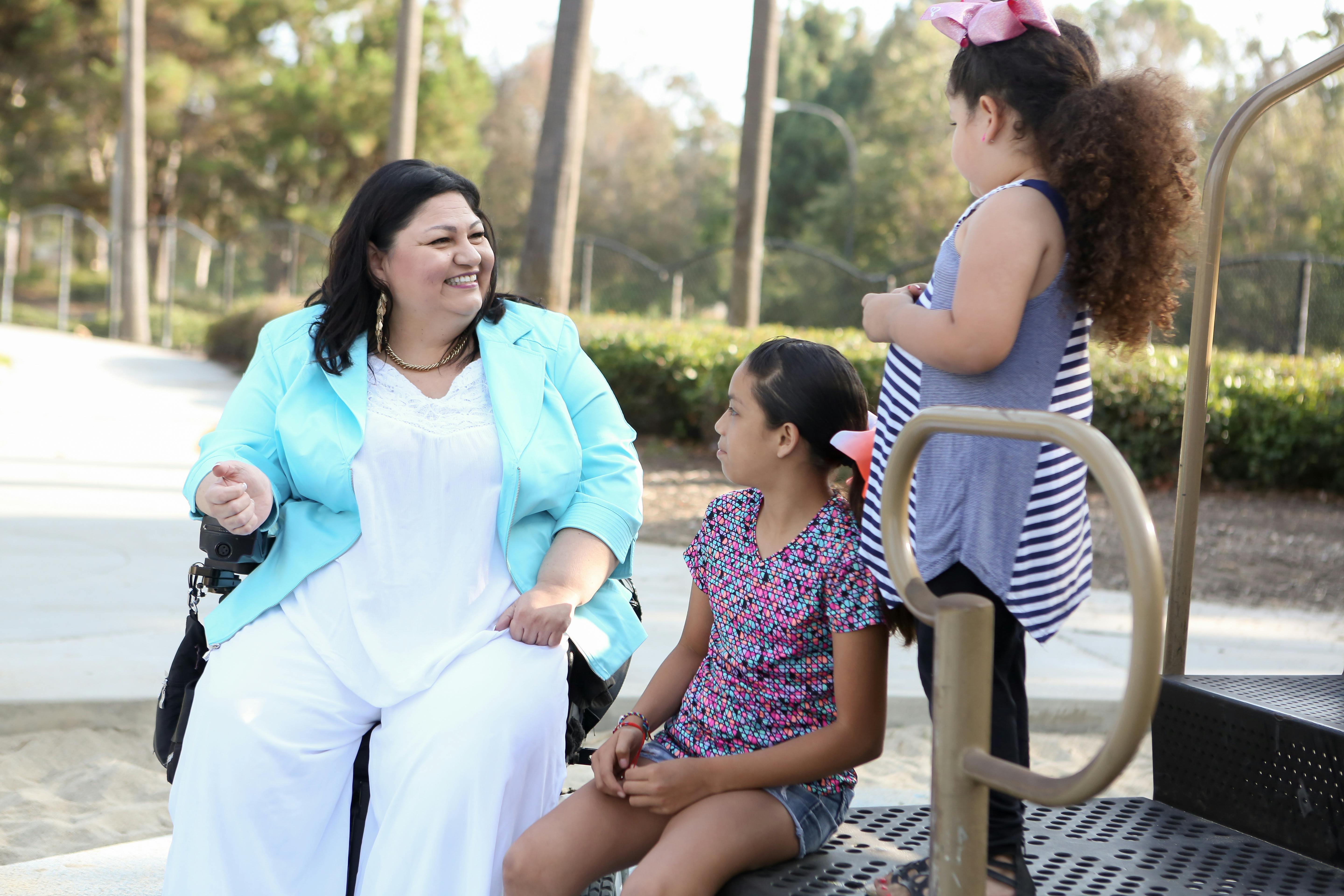 Mary with children at the park