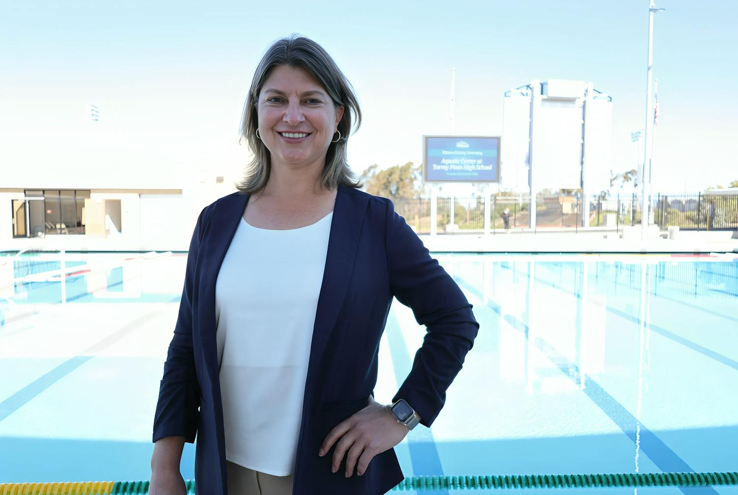 Candidate in front of swimming pool