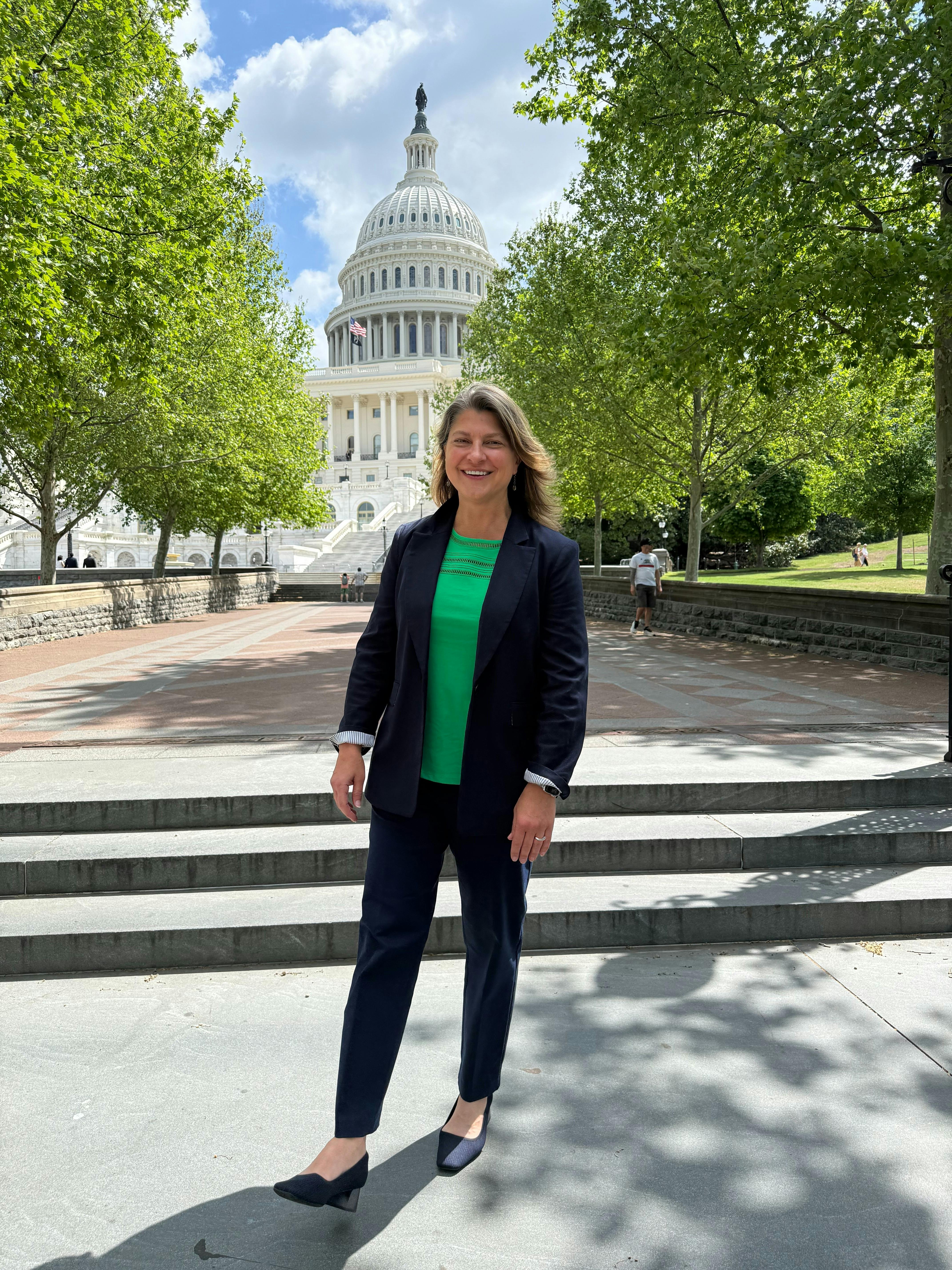Candidate in front of Capitol