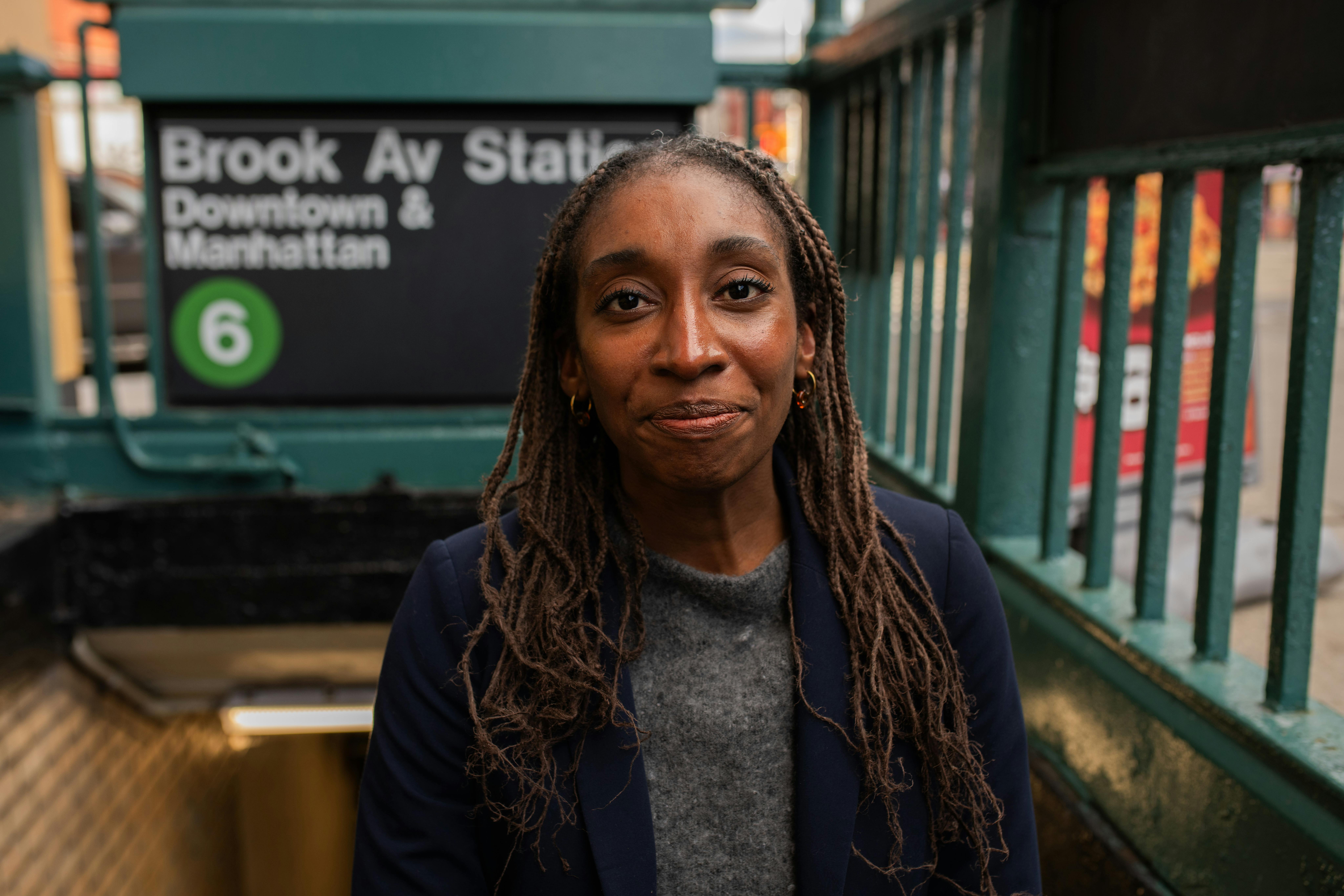 Christina Cover in front of the Brook Avenue train station