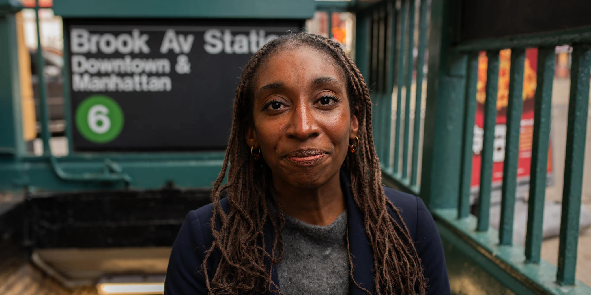 Christina Cover in front of the Brook Avenue train station