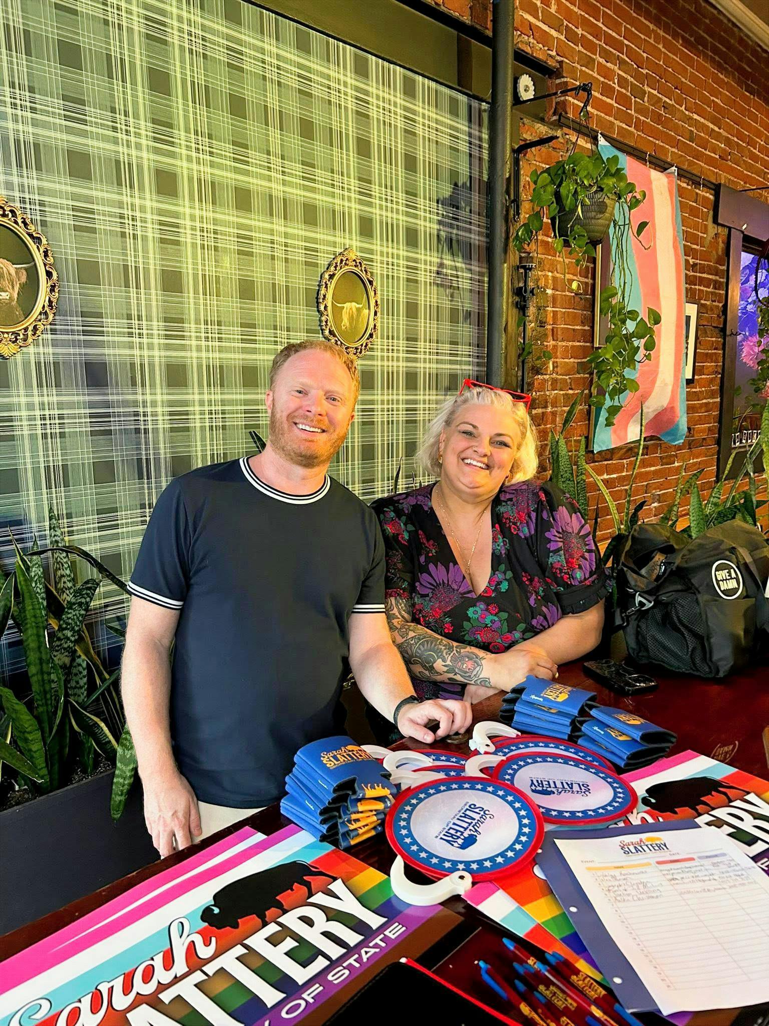 Sarah smiling with a supporter.