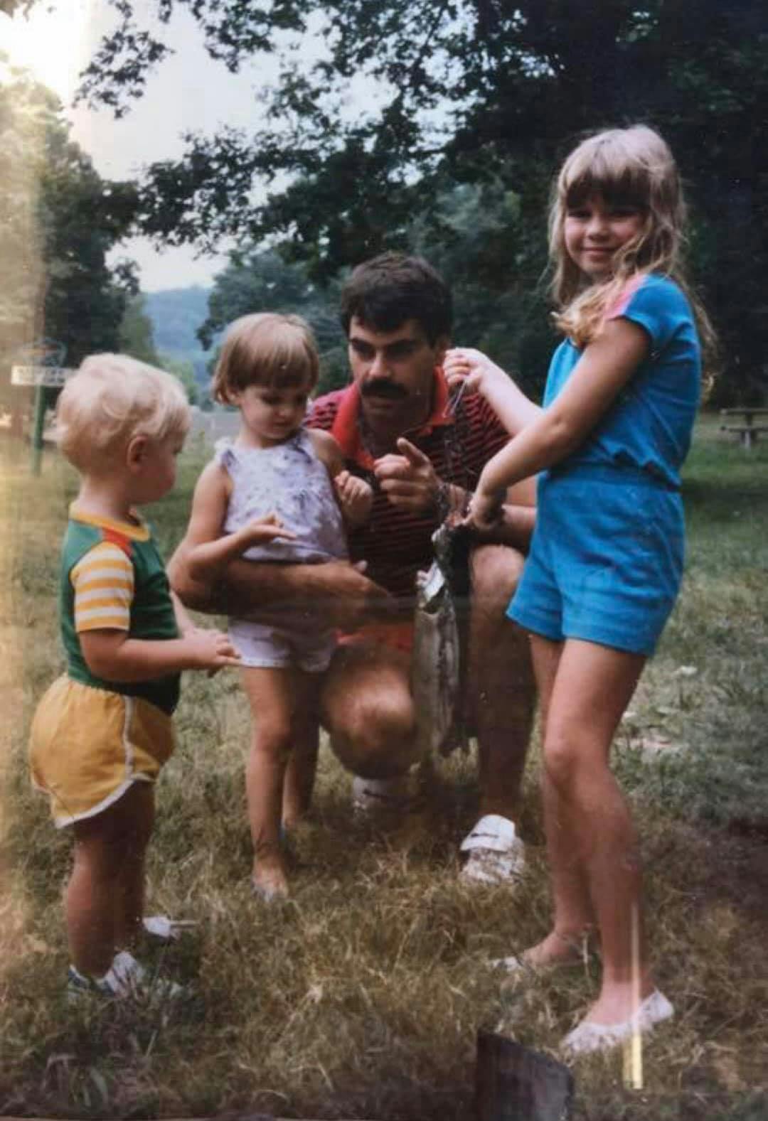 Sarah with her family when she was young