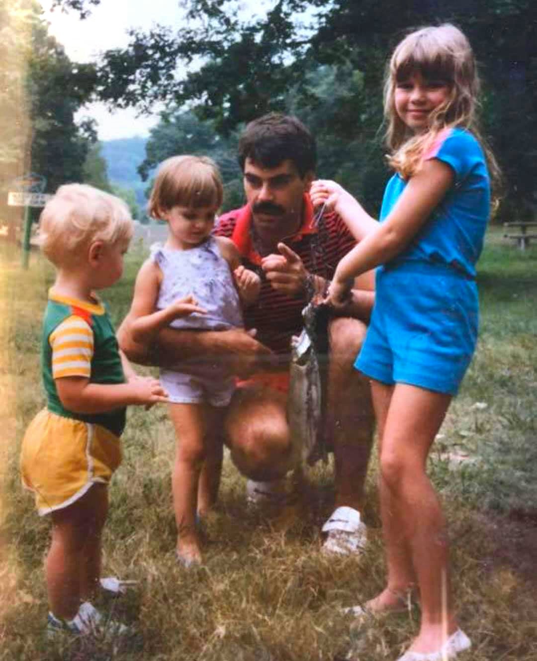 Sarah with her family when she was young
