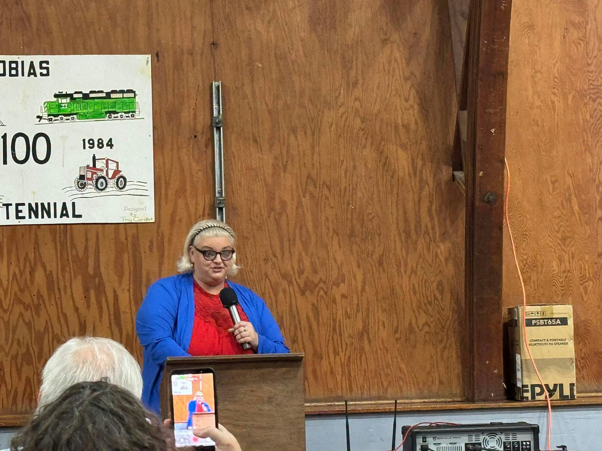 Sarah speaking at a campaign event.