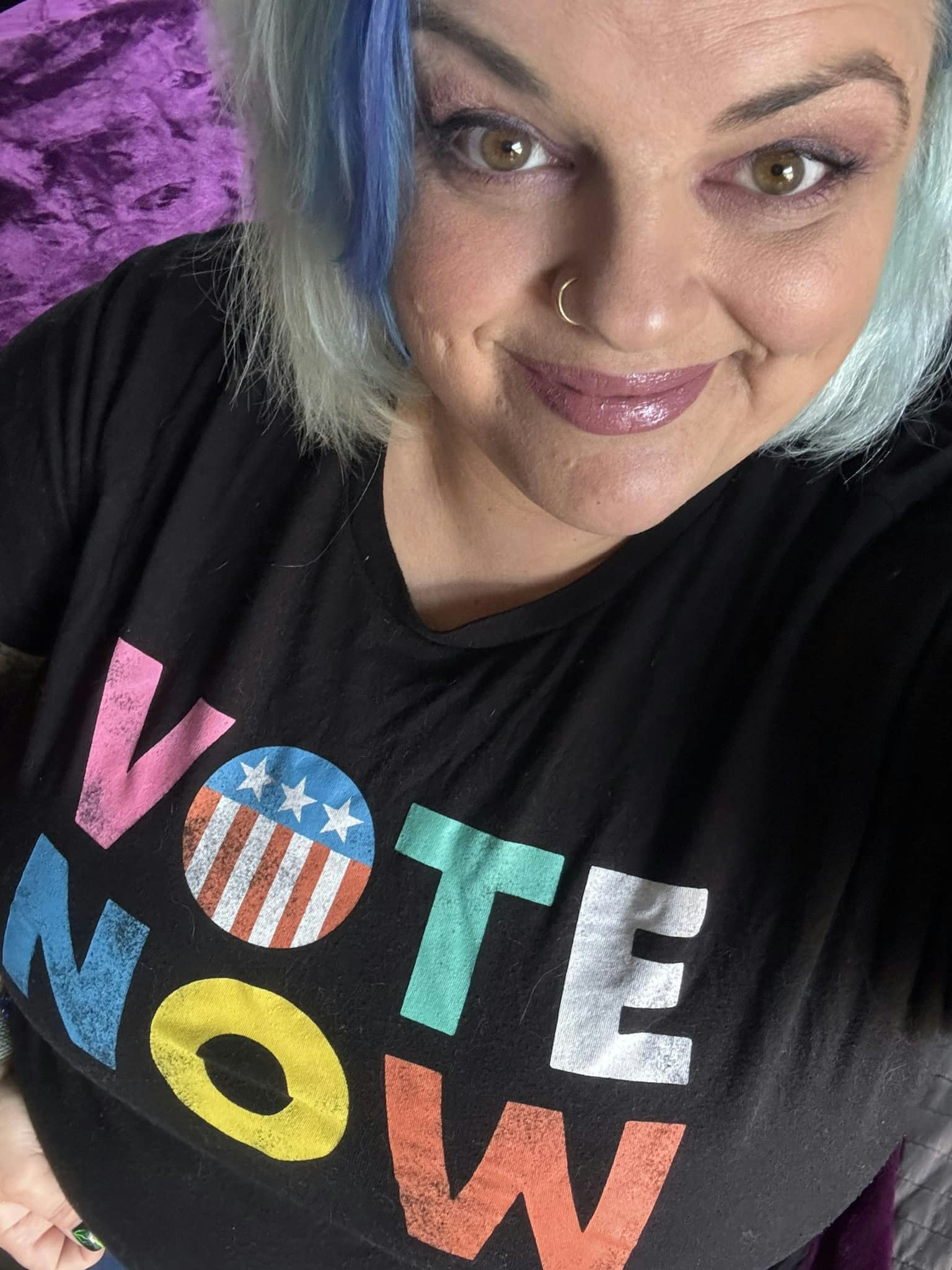 Sarah wearing a vote shirt