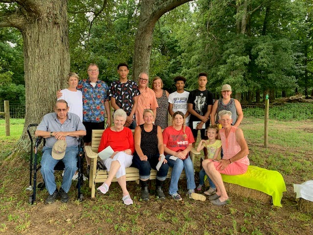 Group ooutside smiling