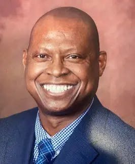 Dr. Reginald "Reggie" Thompkins