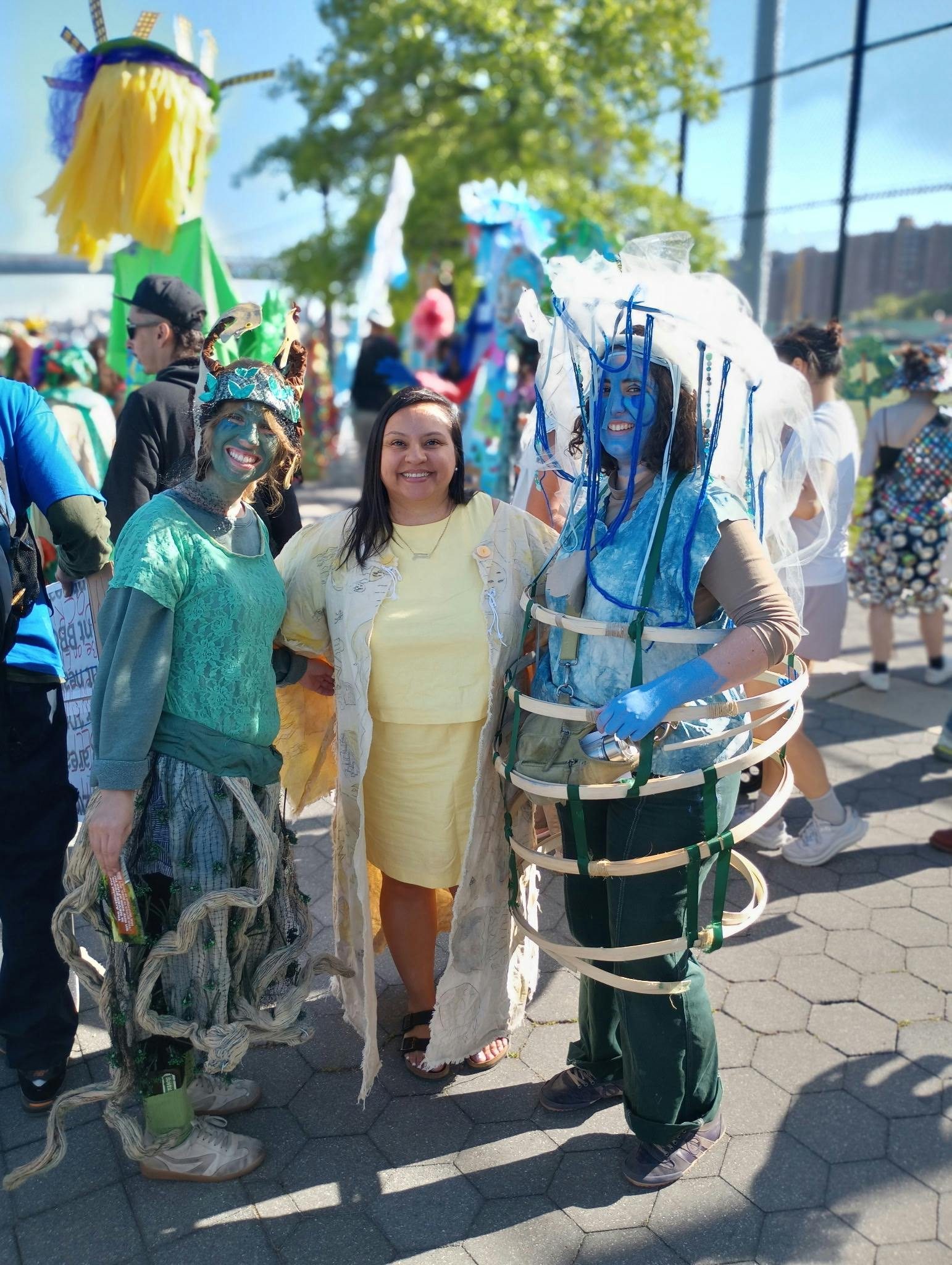 Image of Jasmine Sanchez with two supporters at a community event