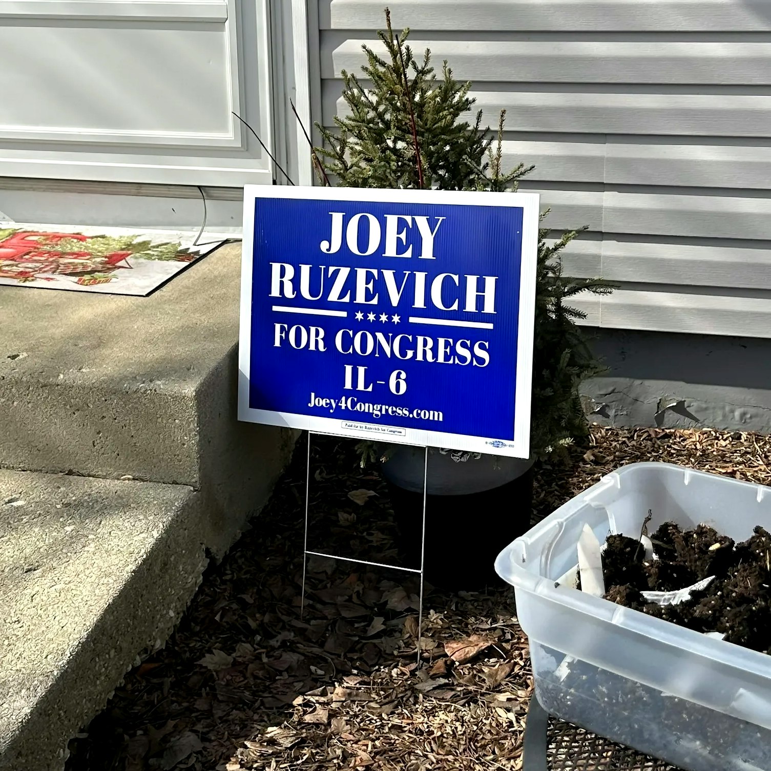 image of Joey's yard sign in front of a suburban home