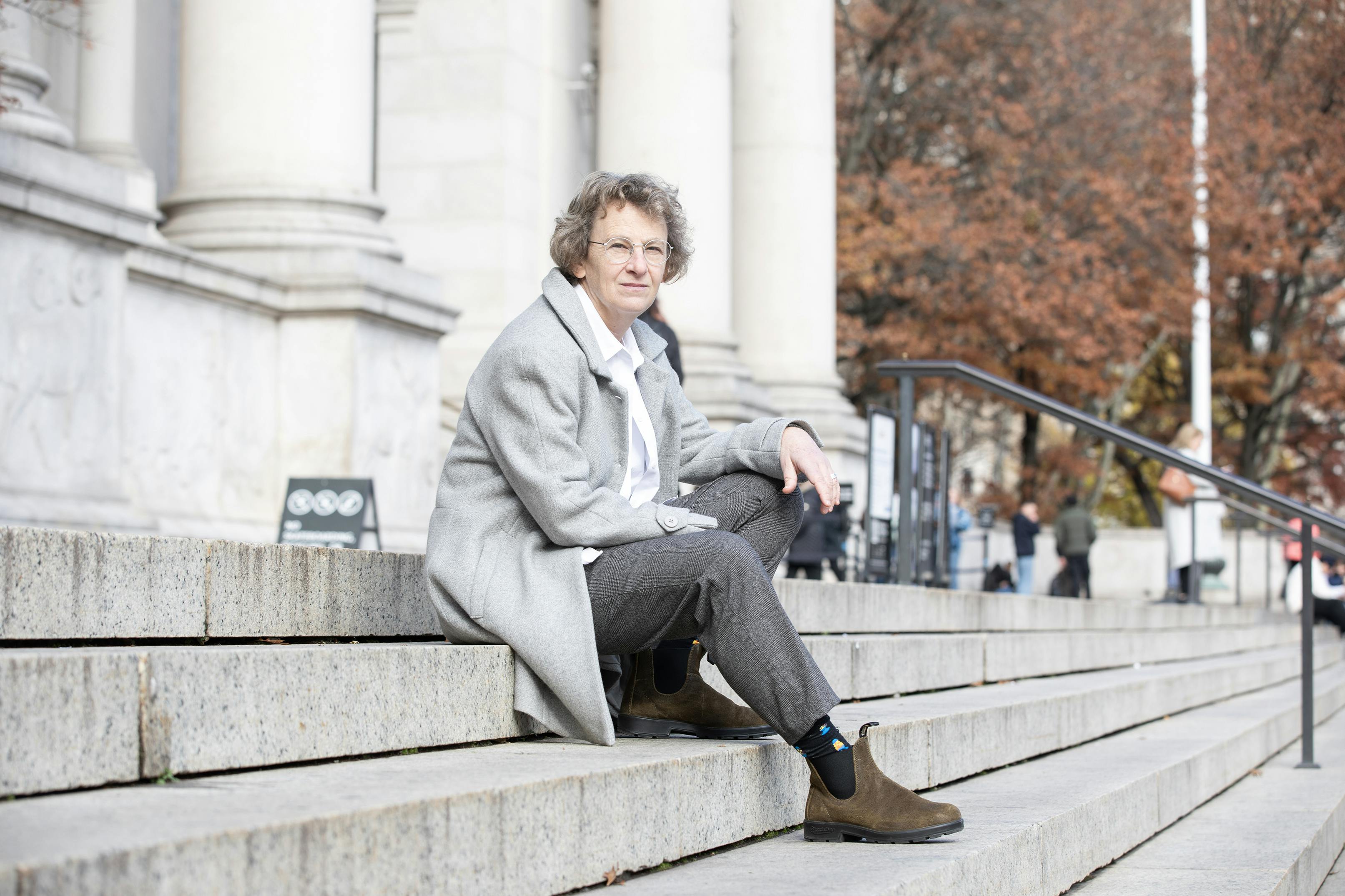 Nina sitting on stairs