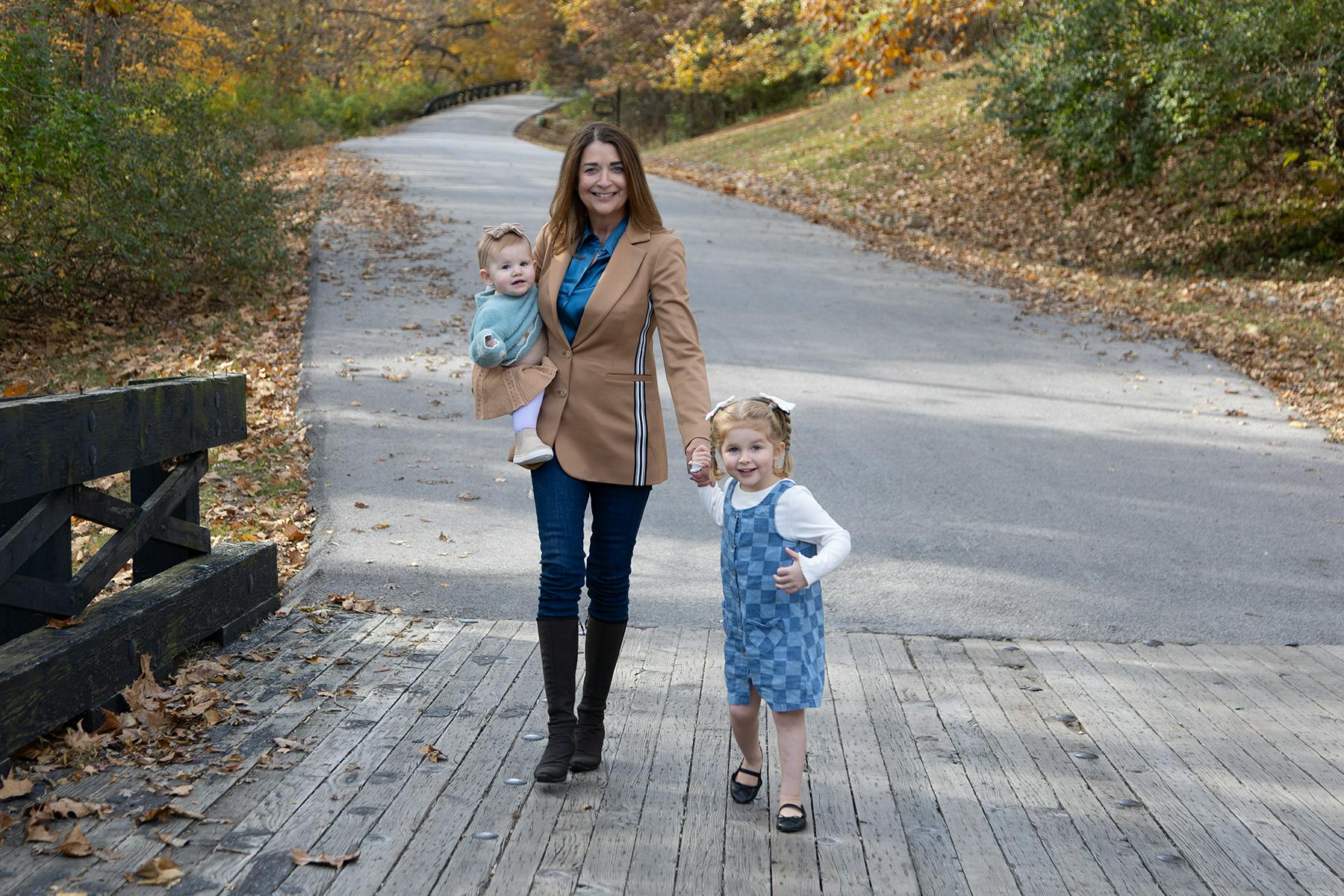 Joan walking with granddaughters