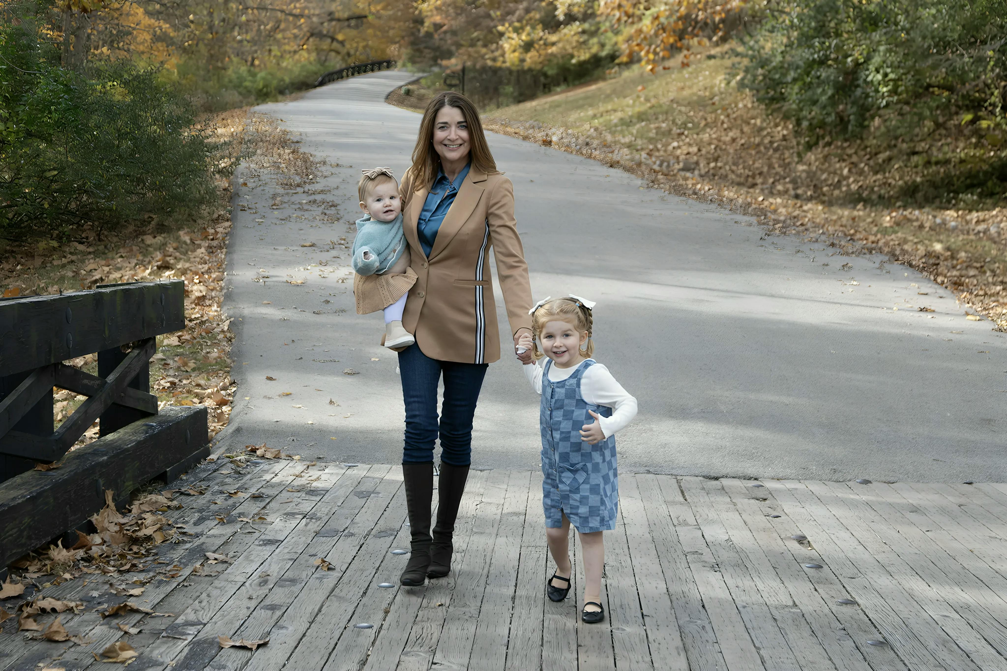 Joan walking with granddaughters