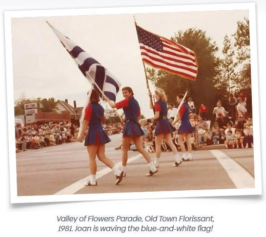 Valley of Flowers Parade, Old Town Florissant, 1981. Joan is waving the blue-and-white flag!