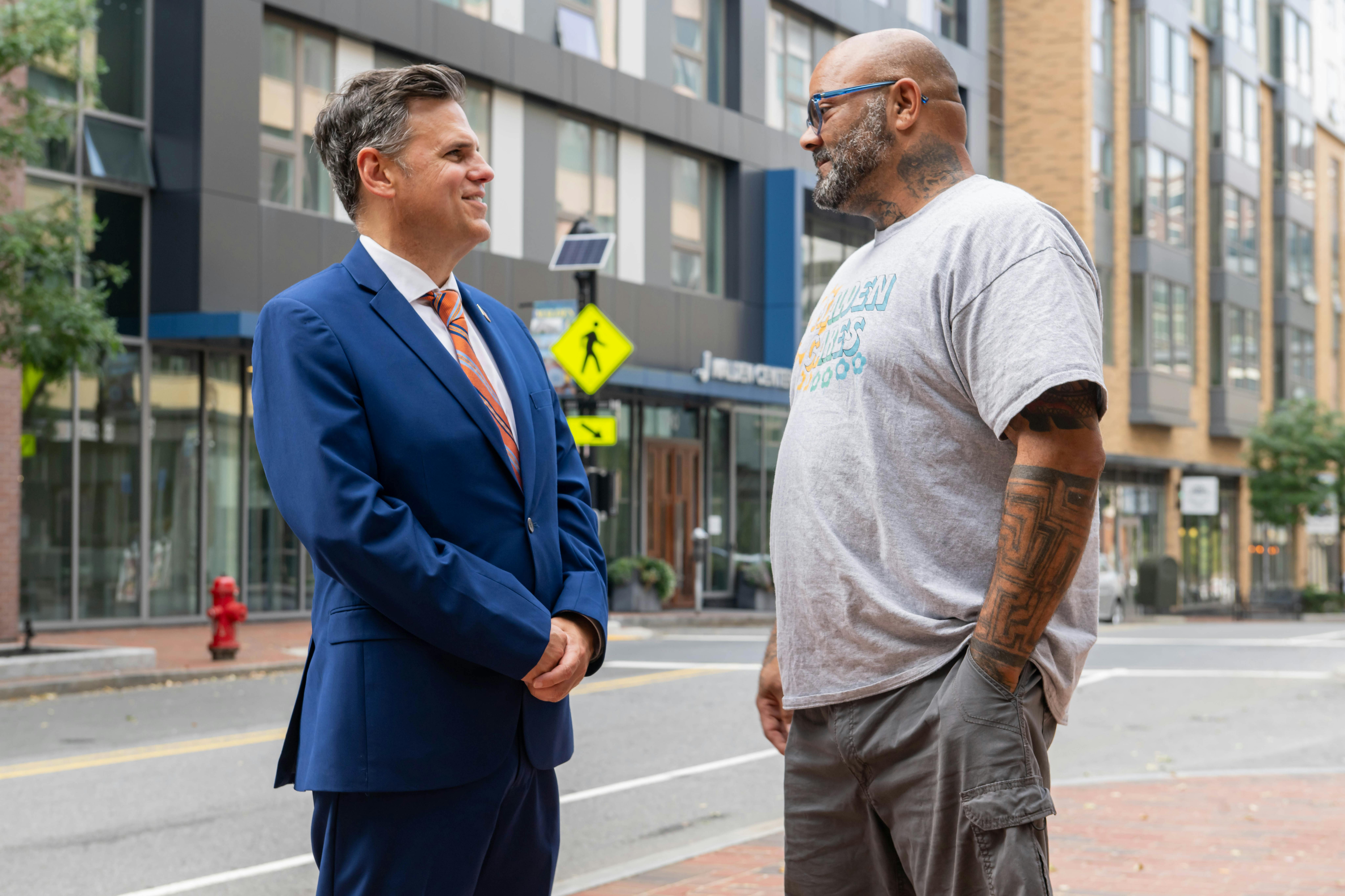 Mayor Christenson and PJ Bell stand together in Malden Center