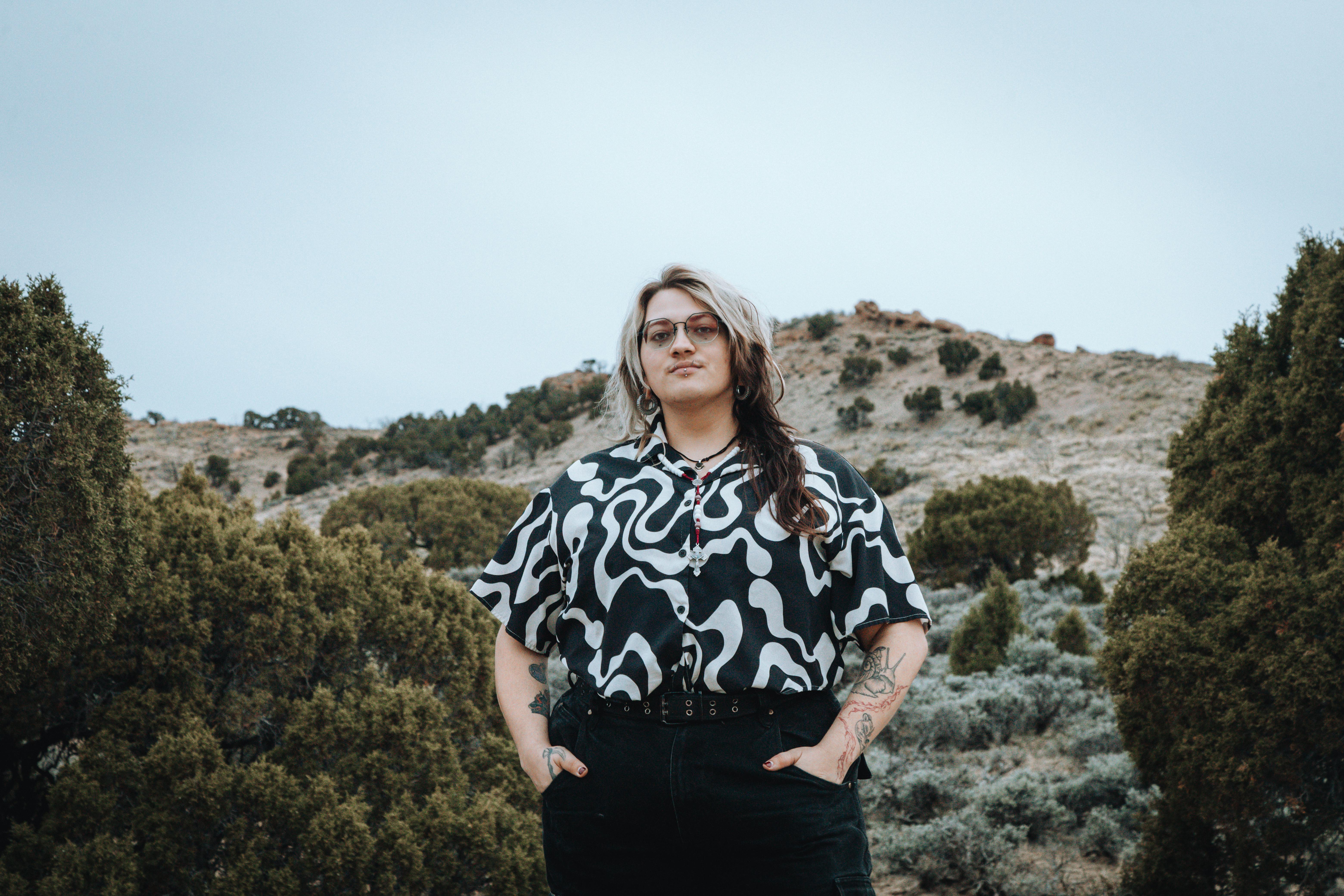 portrait of Rah smiling while out in the hills of Sweetwater county