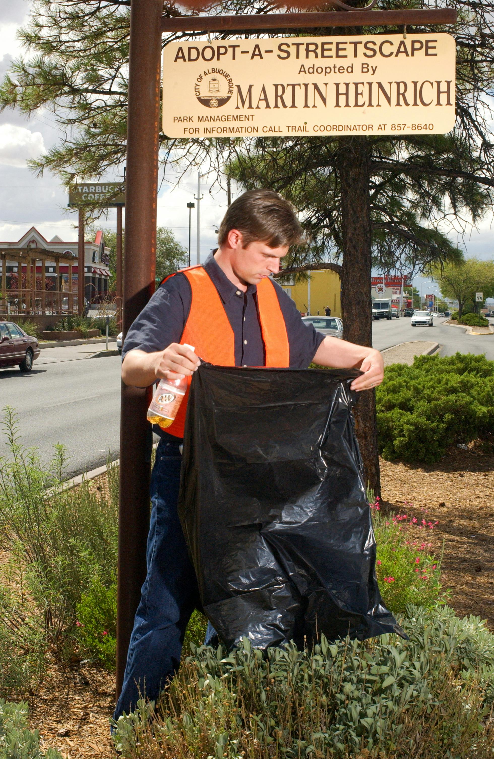 Martin picking up trash