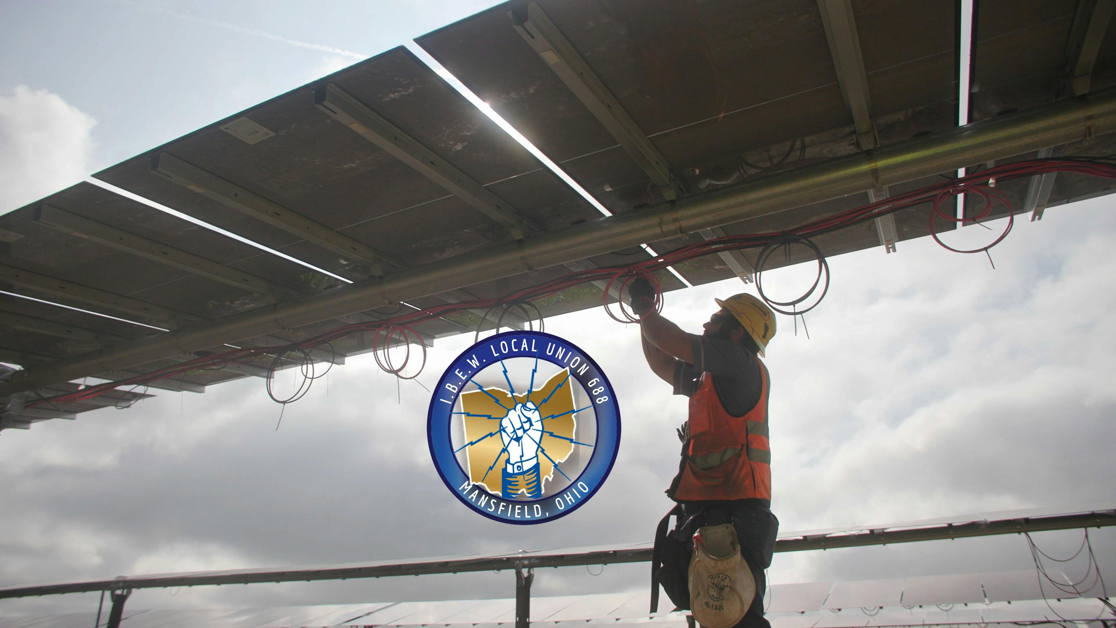 Electrician working on solar panels