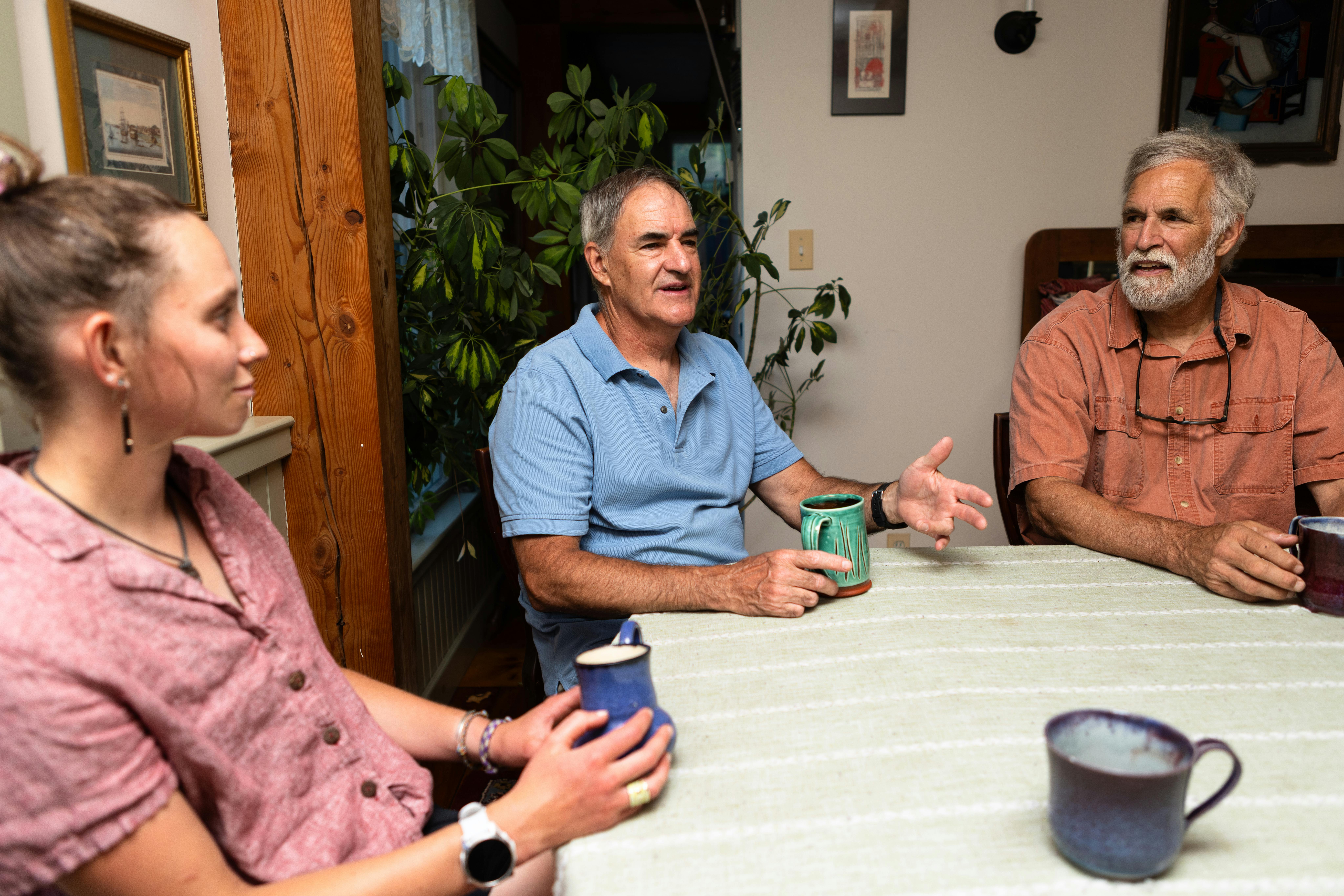 Candidate speaking at a table with another man