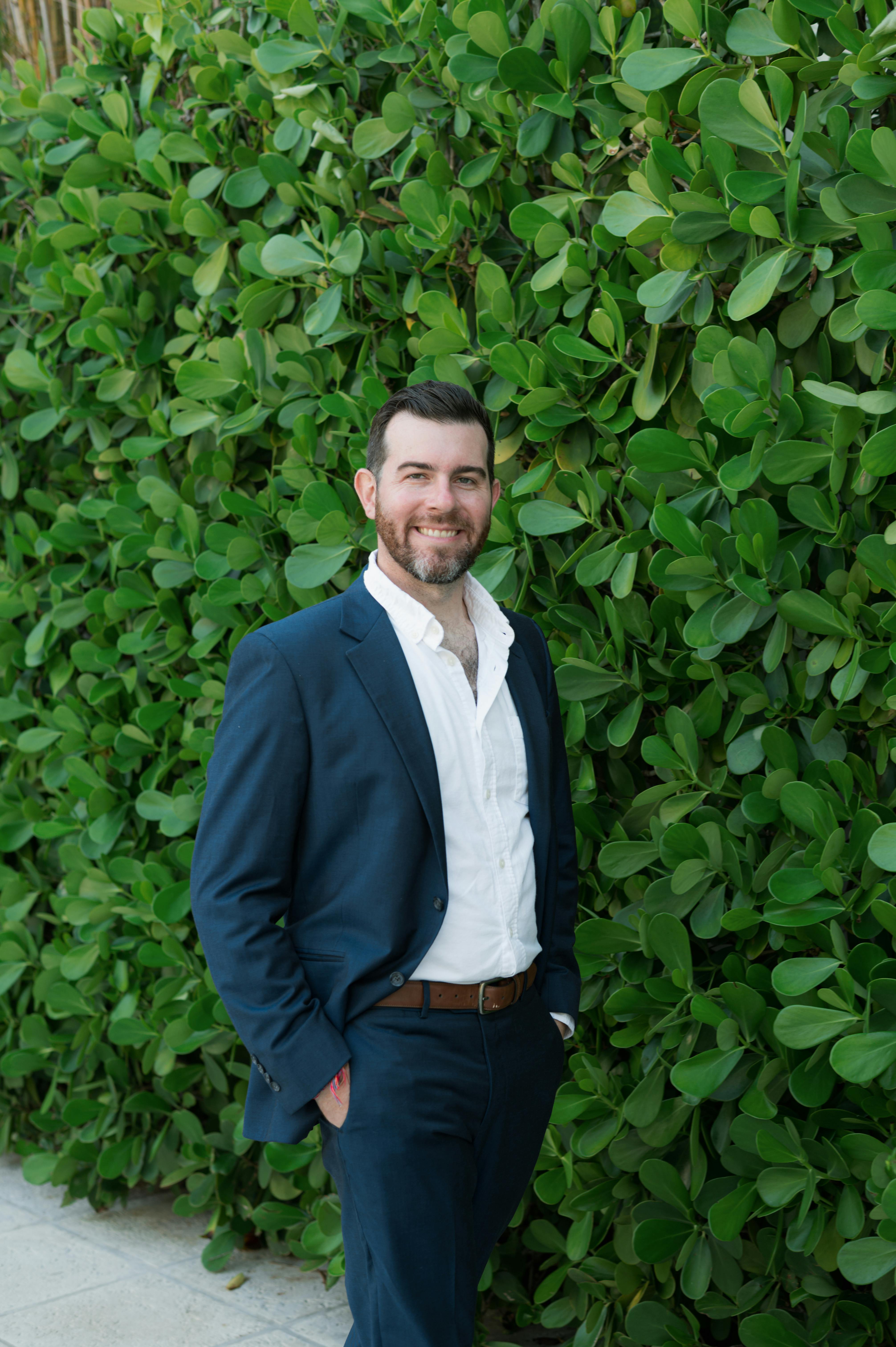 Green Hedge Smiling Portrait