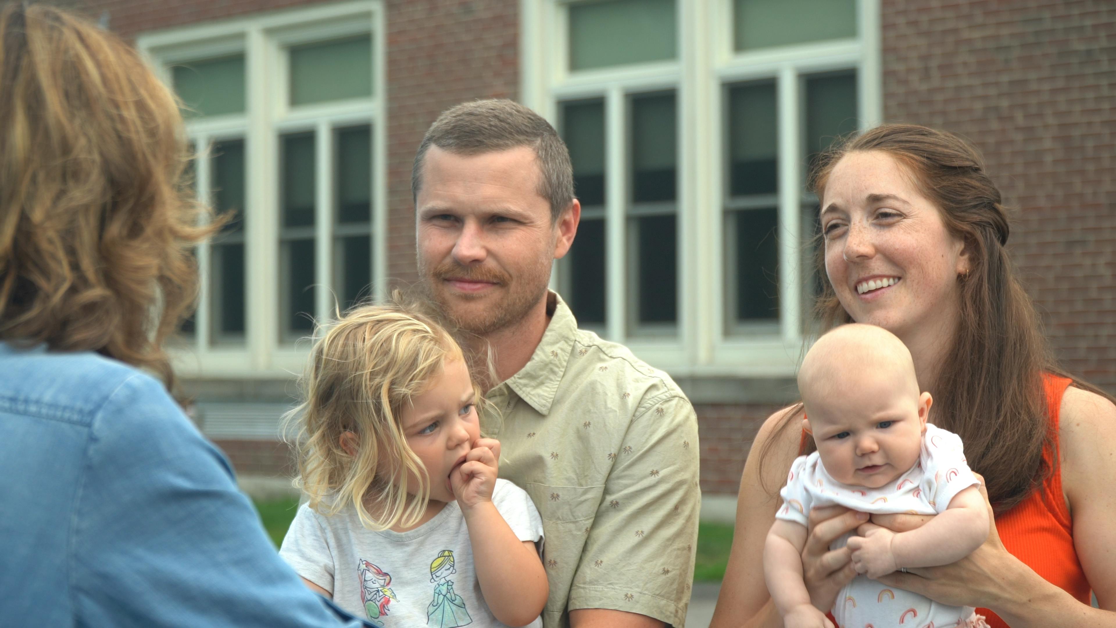 Young parents having a discussion about public education