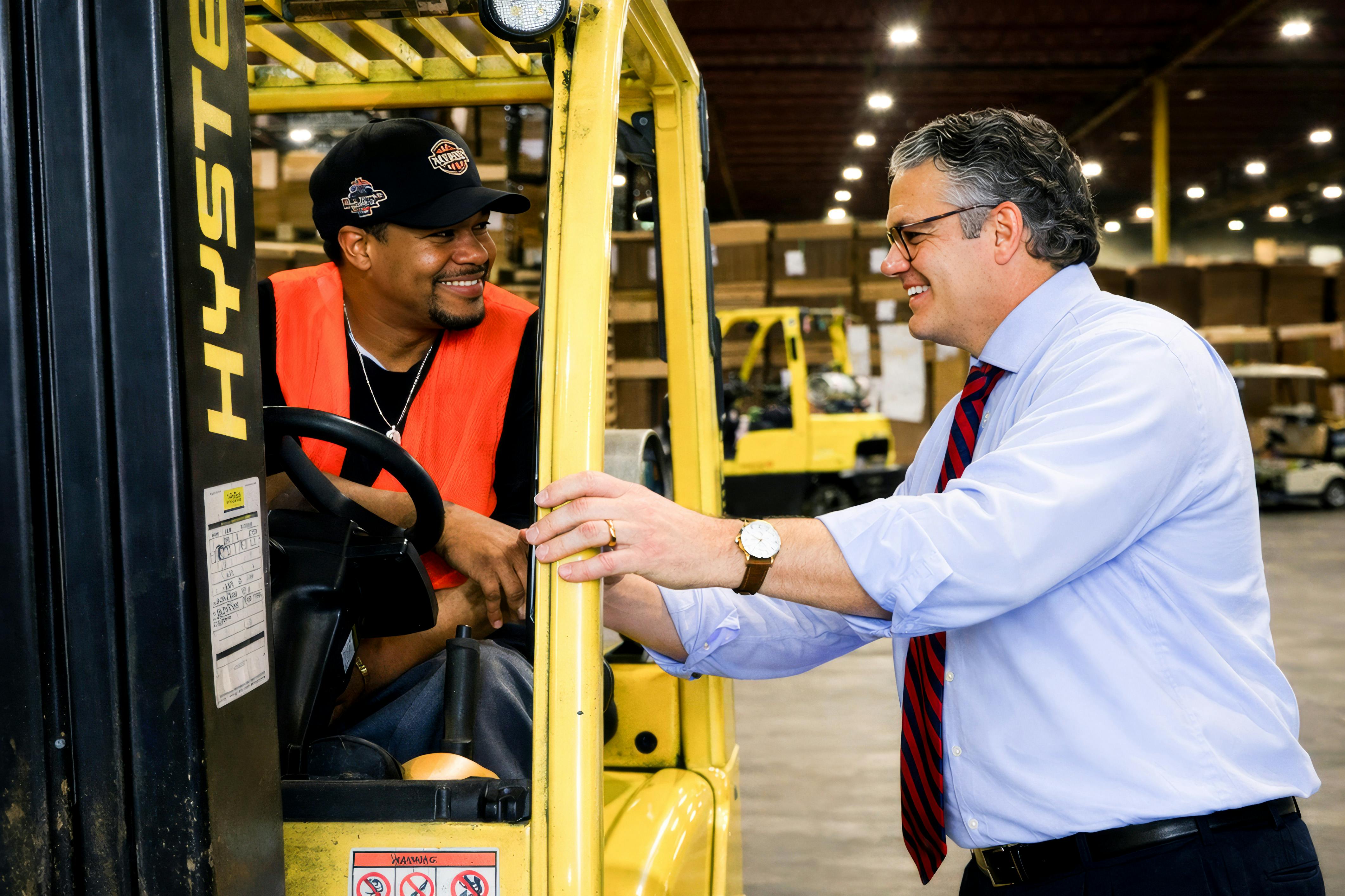 Edward Brown receiving diploma at graduation ceremony