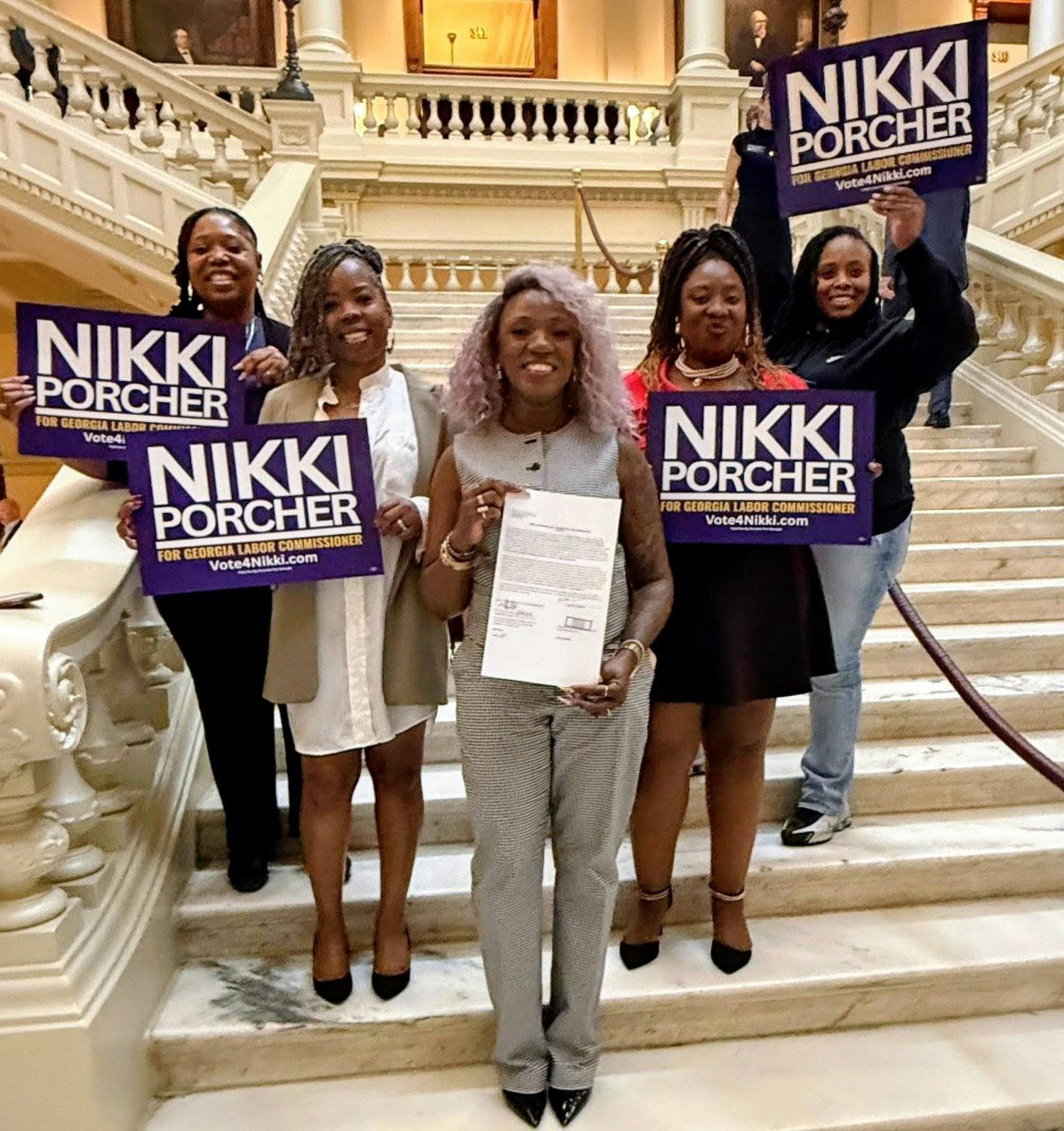 Nikki Porcher at the Capitol with supporters after officially qualifying for the Labor Commissioner race