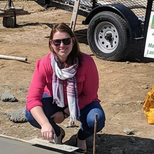 Katie Clendaniel works at the High Street vacant lot refurbishment site in Cambridge.