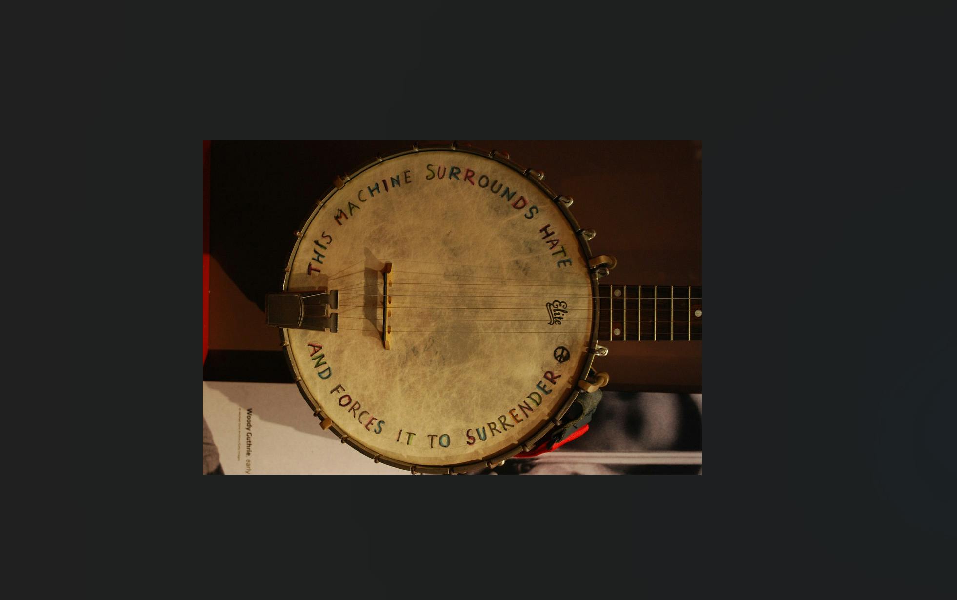 “Pete Seeger Banjo” by Megan Westerby, licensed CC BY 2.0.
