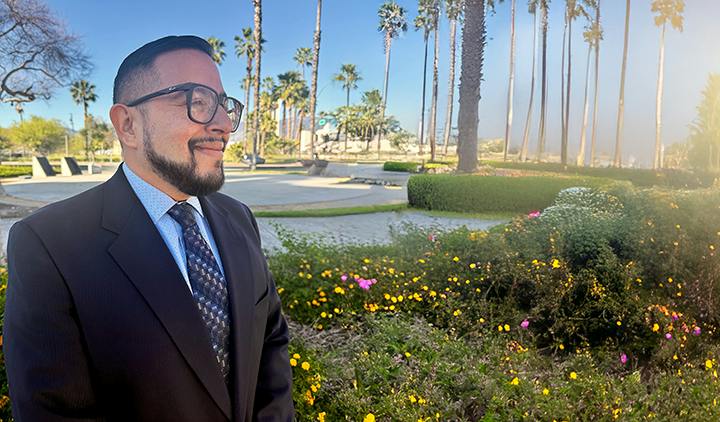 Ron Alvarado speaking with San Bernardino residents