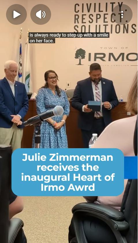 Julie receiving Heart of irmo Award