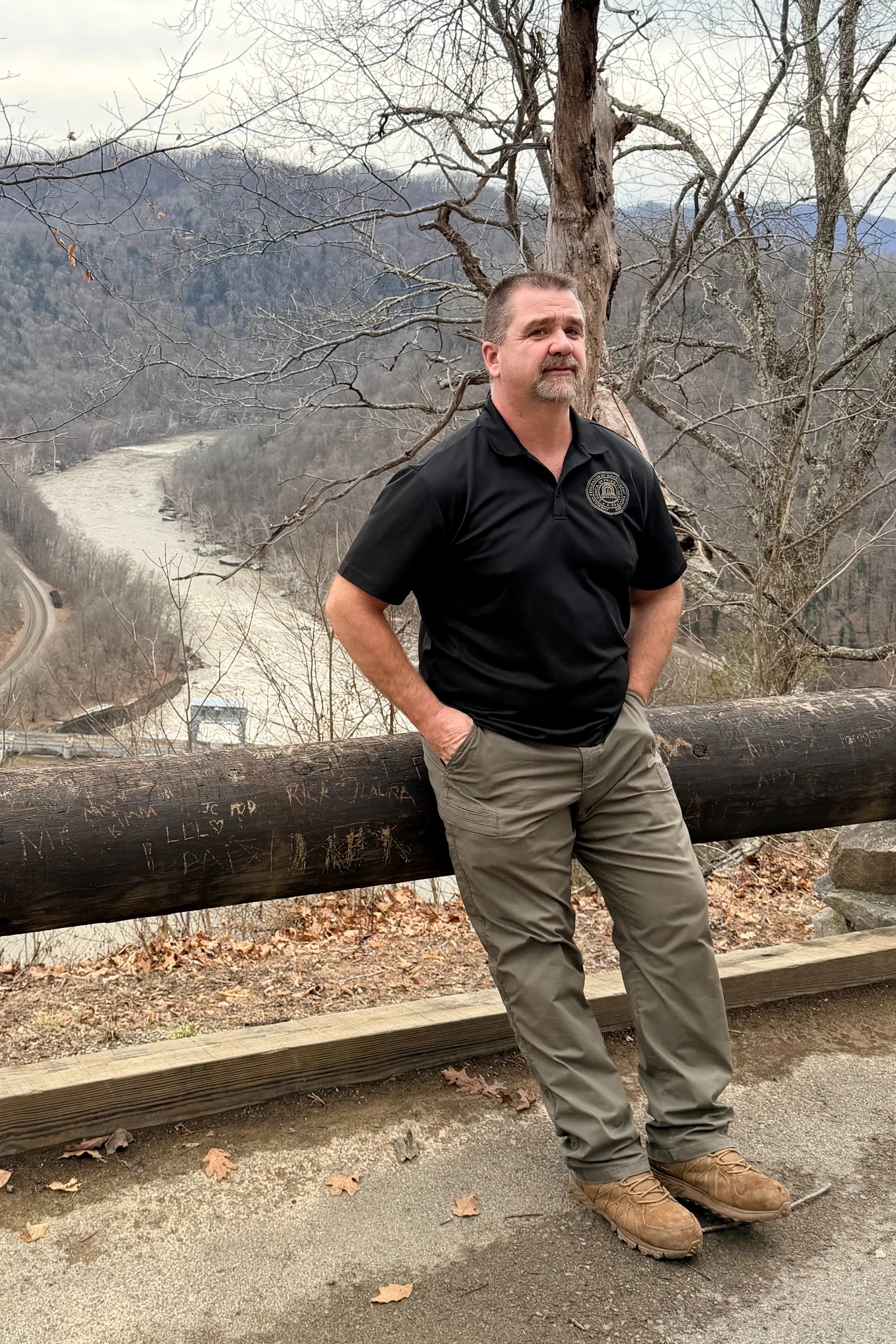 Kent standing with river in the background