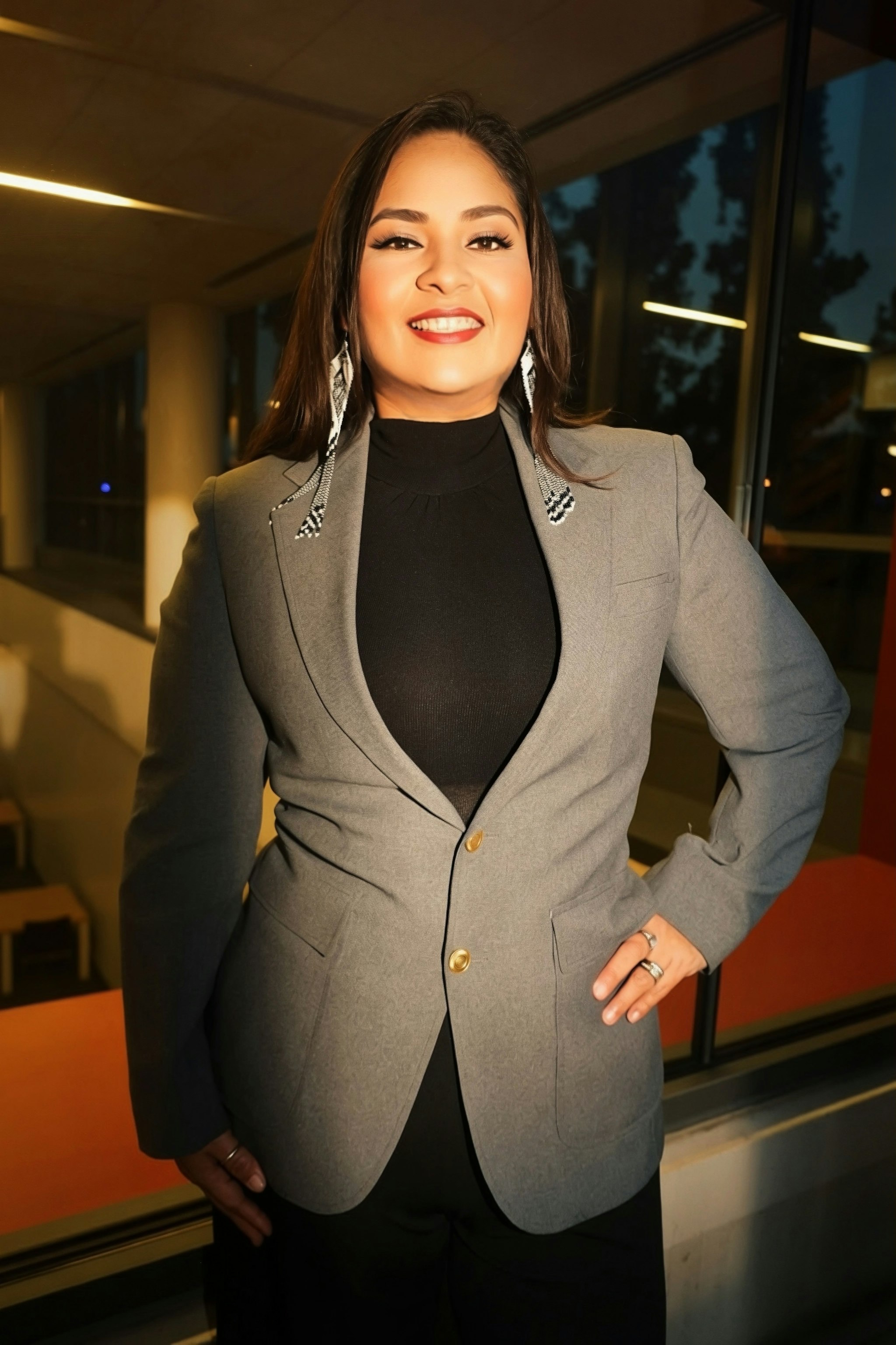 Maria Pacheco smiling with group of people beside her