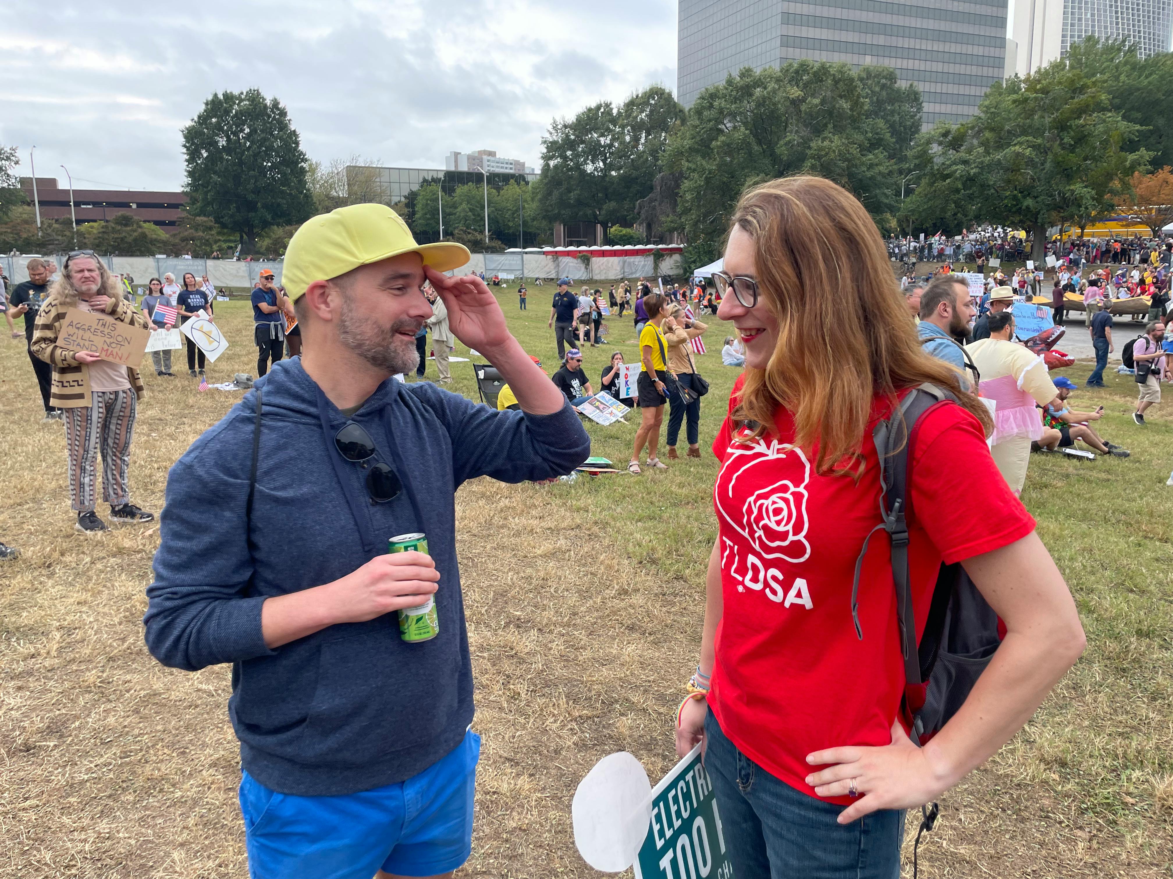 Aaron talking with one of her fans at a NO KINGS rally