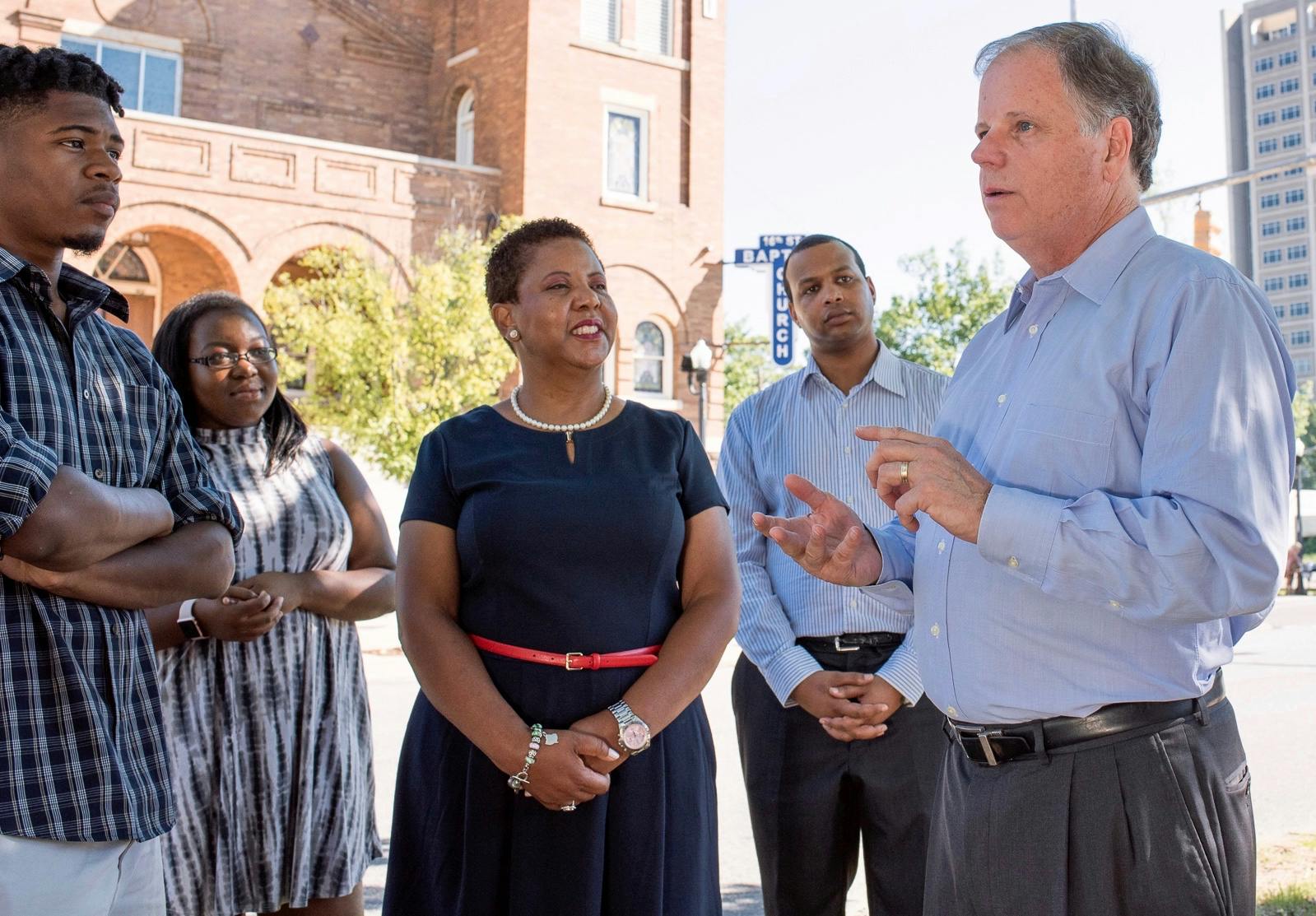Doug Jones meeting outside Birmingham's 16th Street Baptist Church