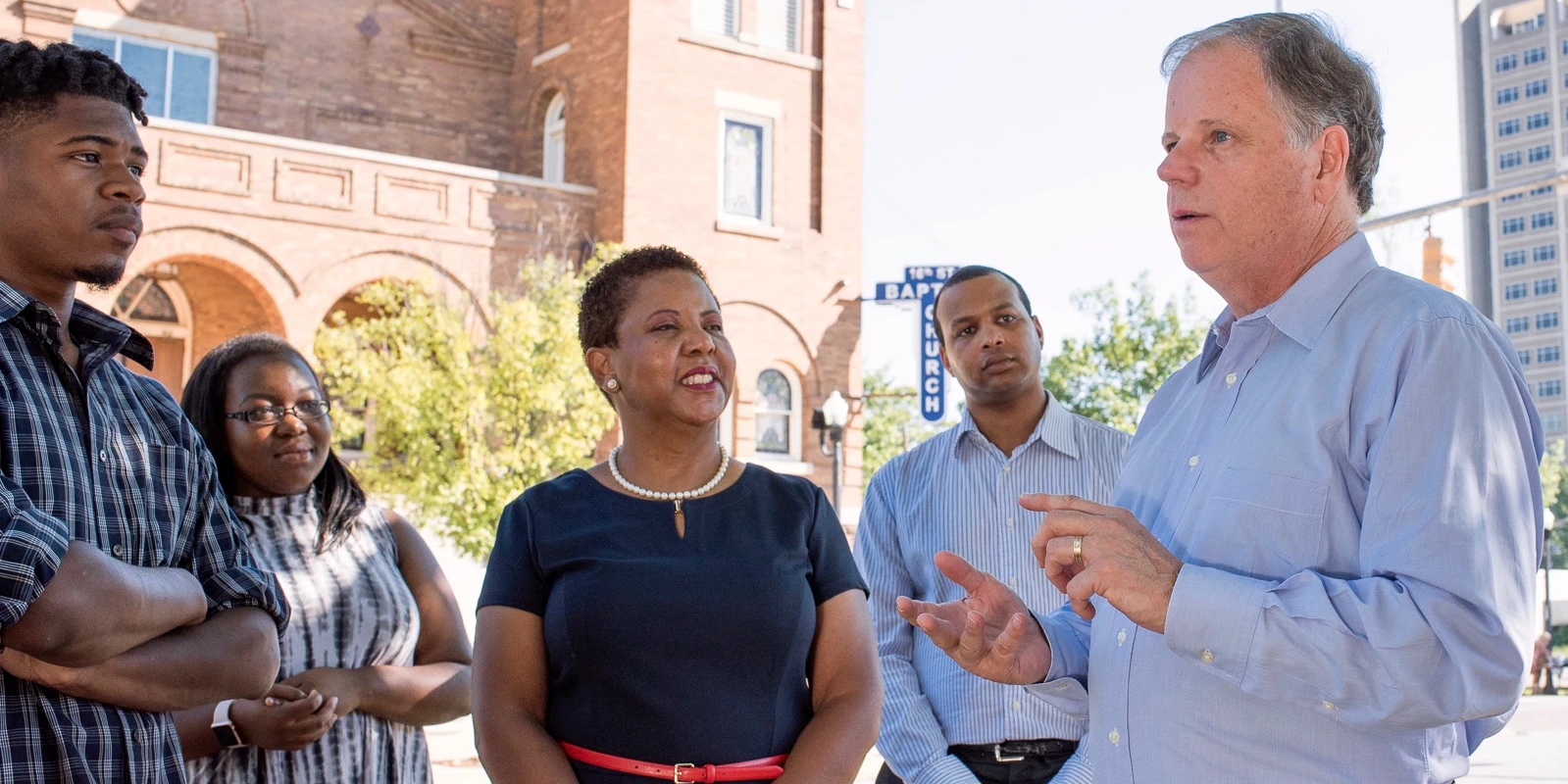 Doug Jones meeting outside Birmingham's 16th Street Baptist Church