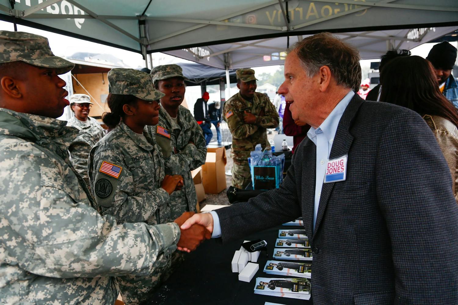 Doug Jones greets soldiers